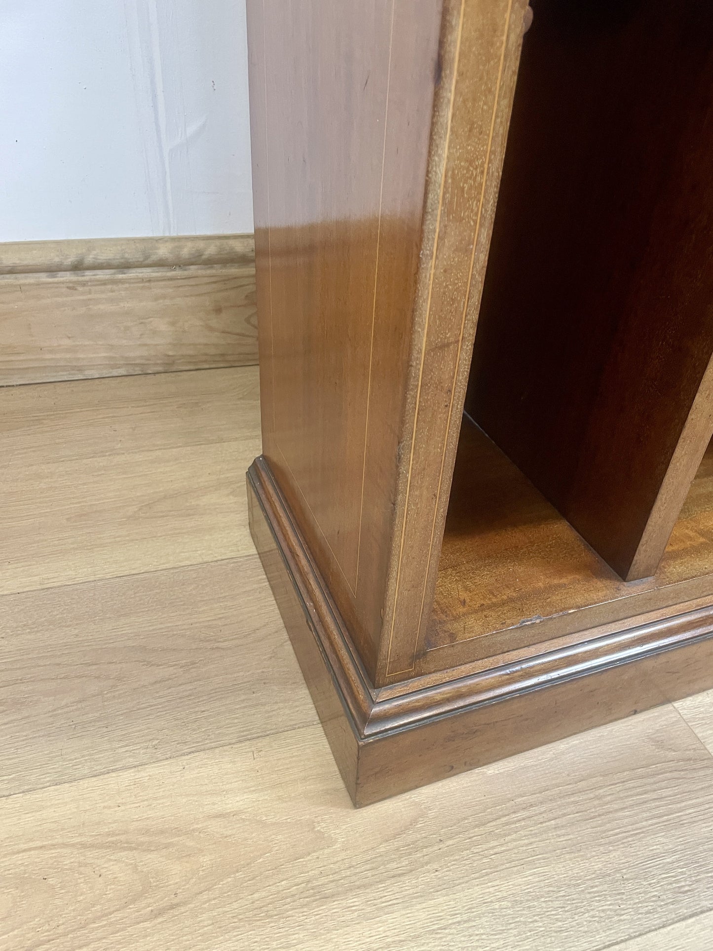 Wooden furniture corner on a light wood floor