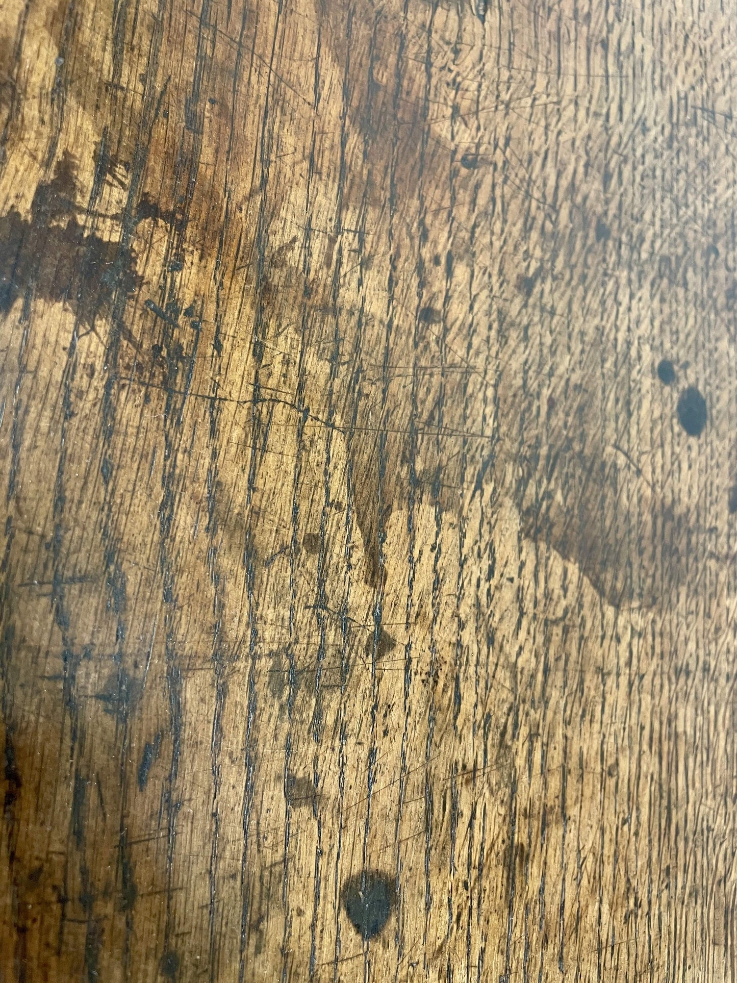Close-up of a wooden surface with visible grain and texture