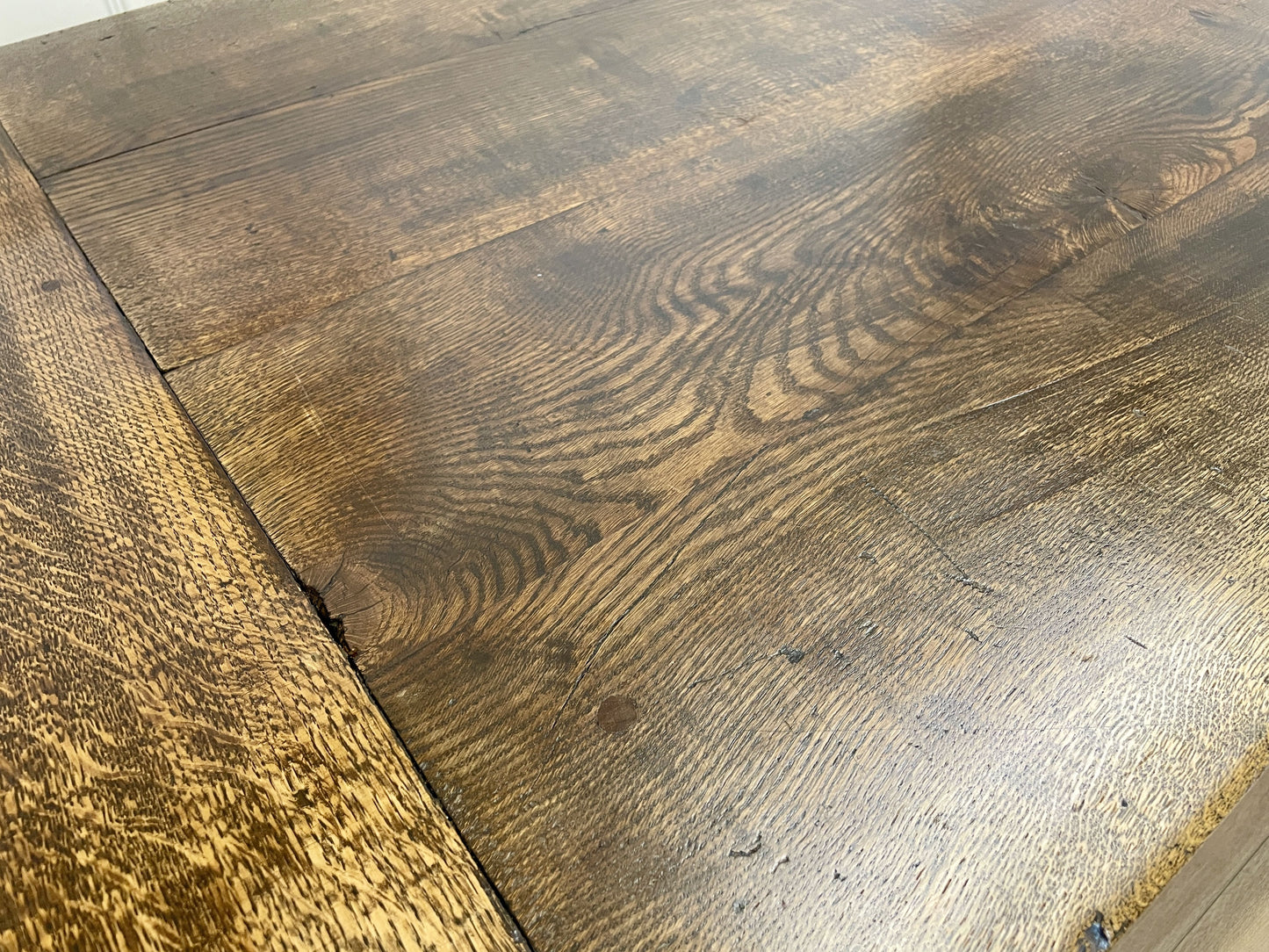 Close-up of a wooden floor with visible grain and texture