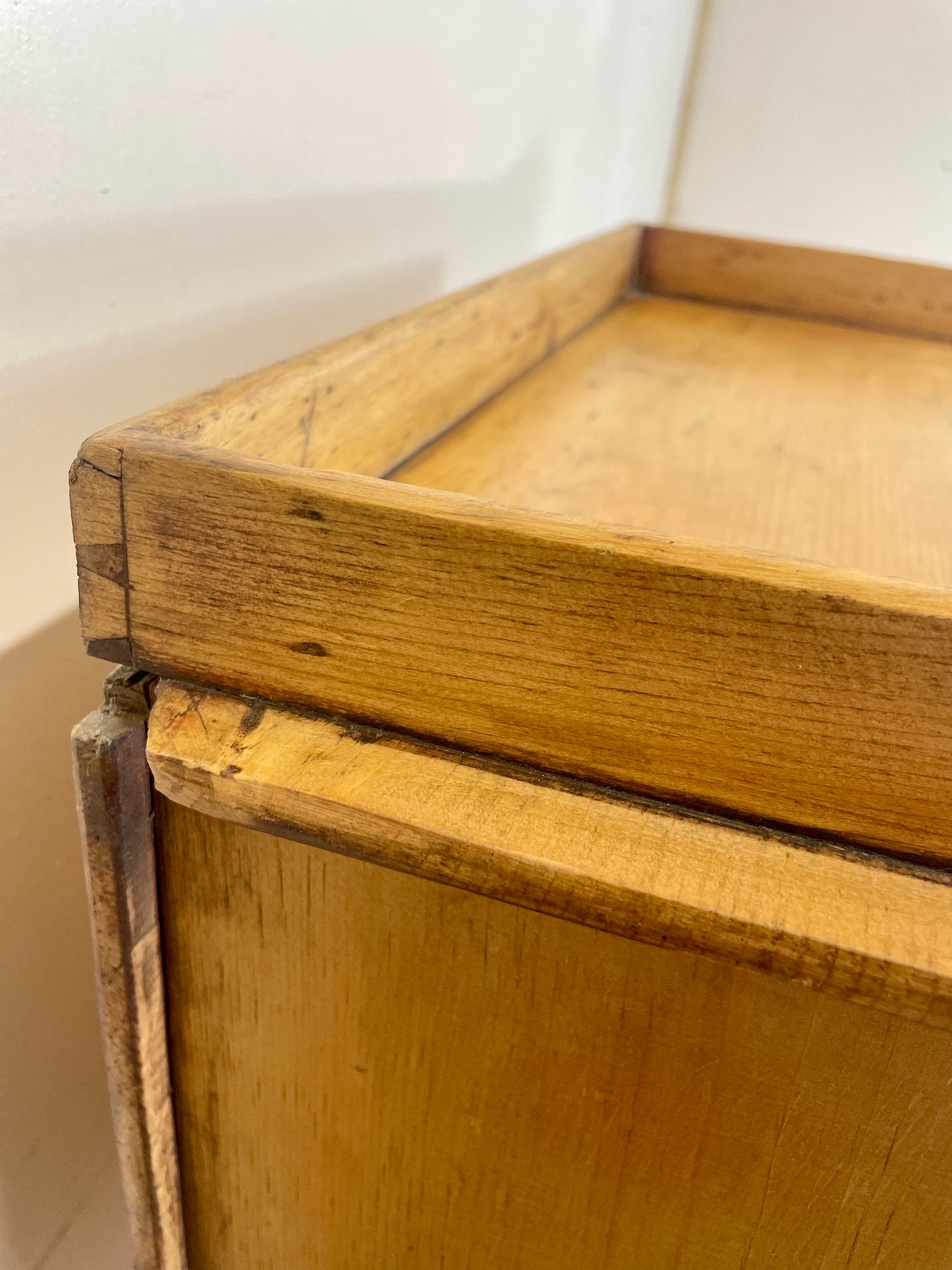 Wooden crate with a lid on a white background