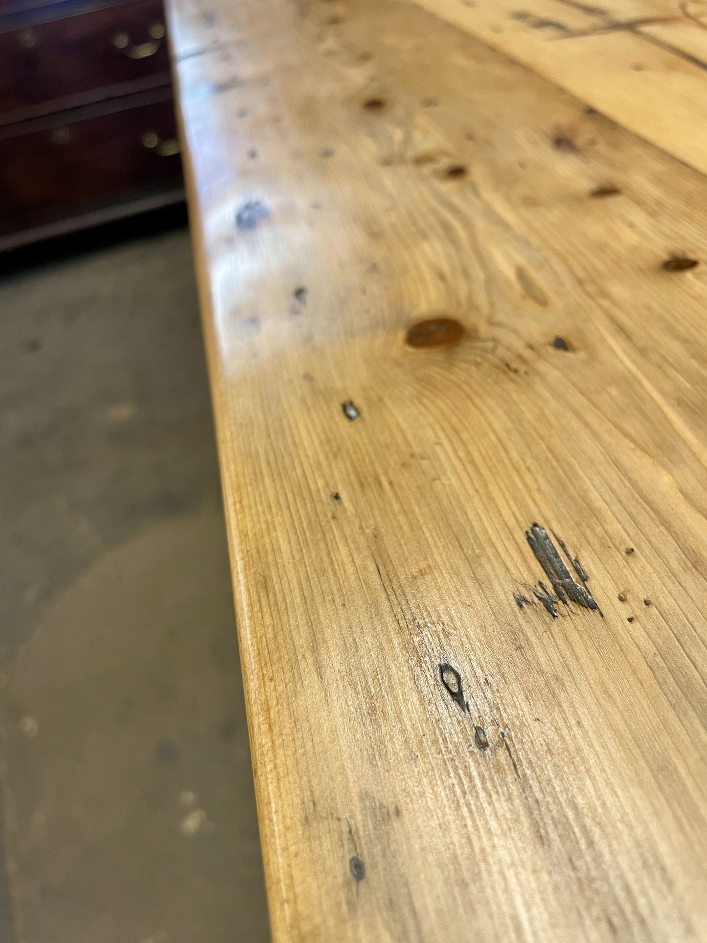 Close-up of a wooden surface with visible grain and texture