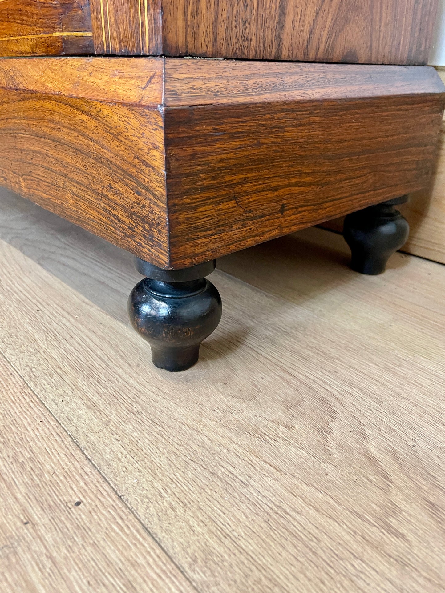 Wooden furniture leg on a wooden floor
