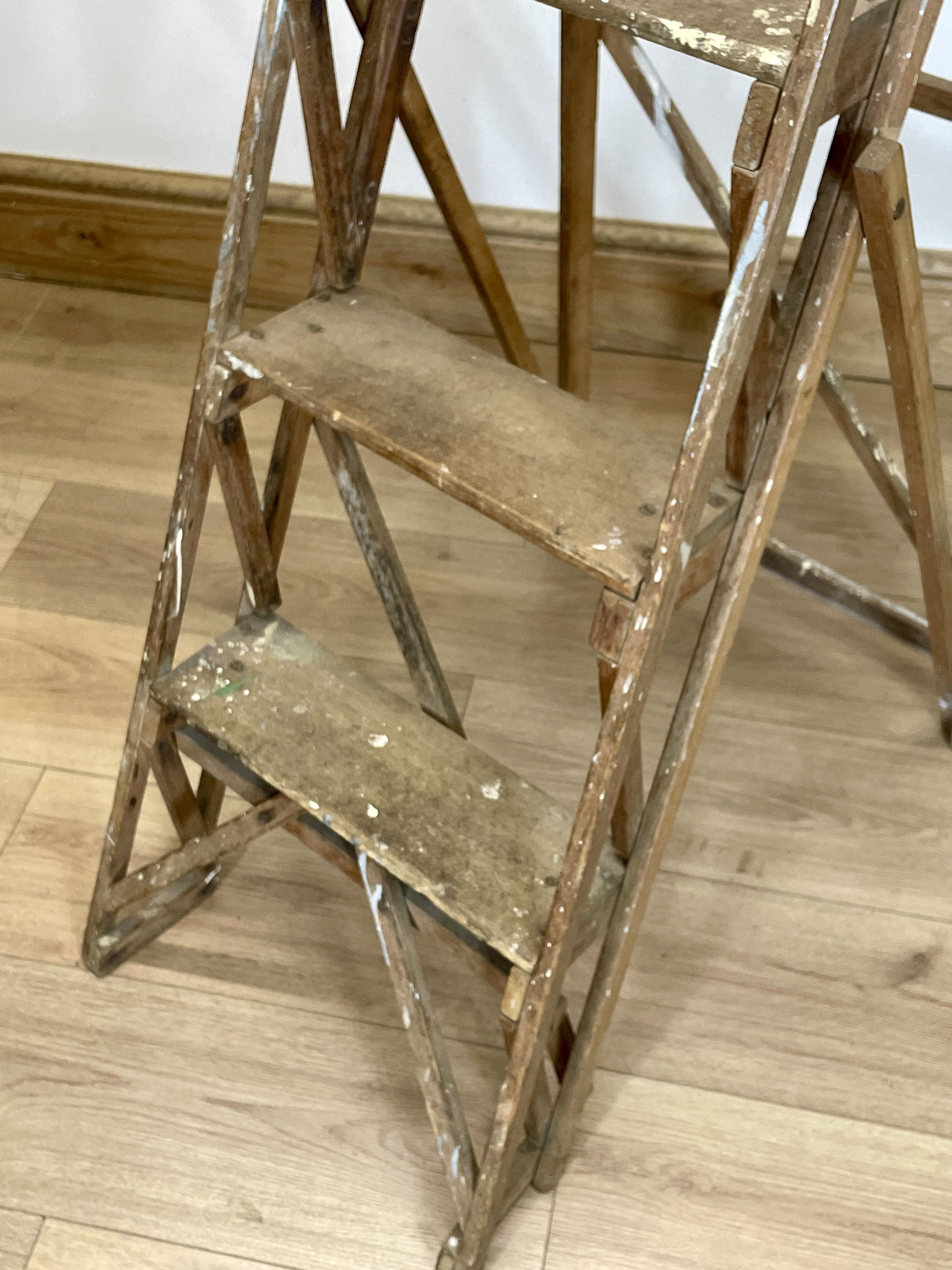 Wooden step ladder on a wooden floor