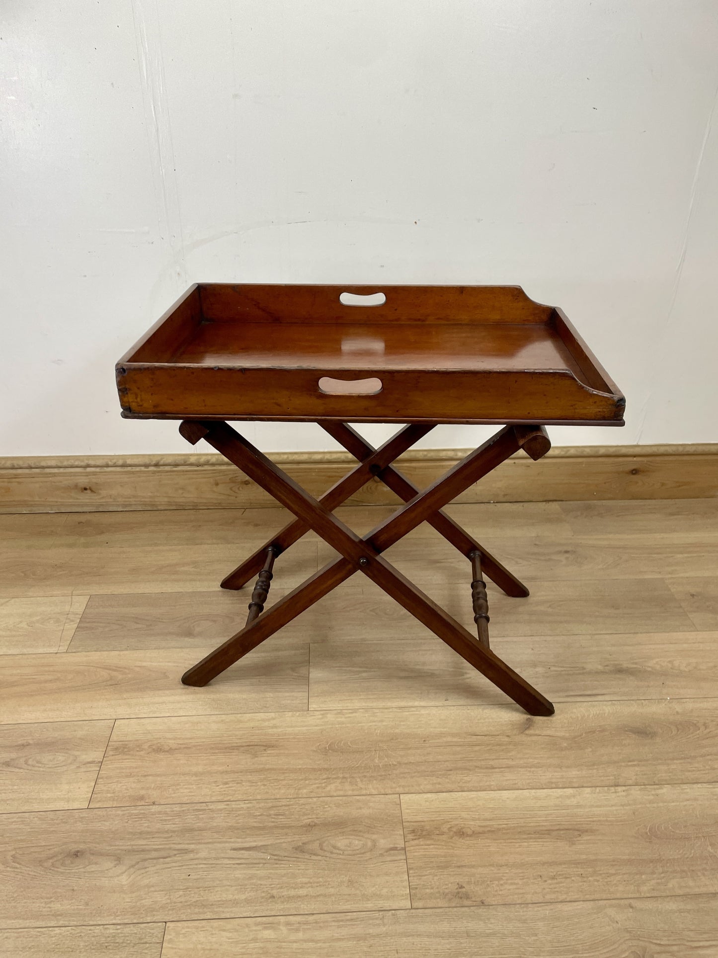 Wooden tray table with a white background