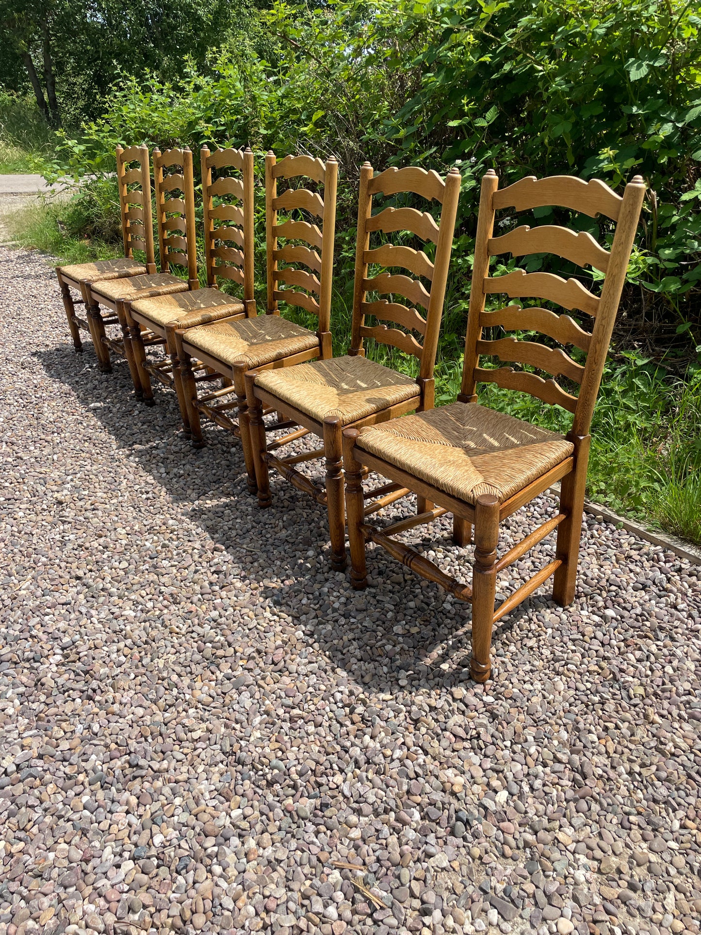 Vintage set of 6 light oak ladder back chairs
