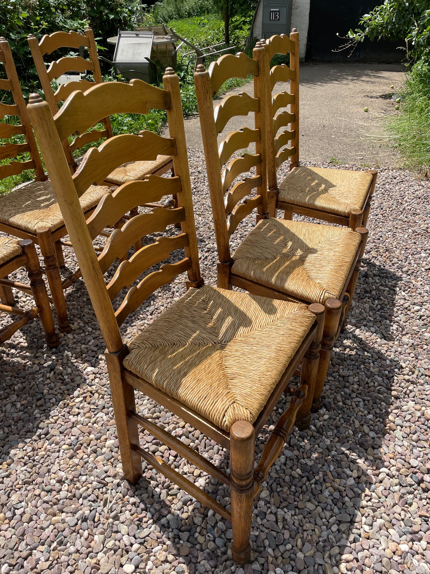 Vintage set of 6 light oak ladder back chairs