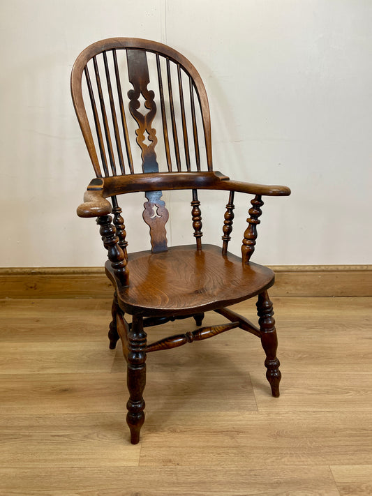 Antique Windsor Yorkshire Broadarm Armchair with stick back design, made of ash and elm wood, showing signs of professional restoration.