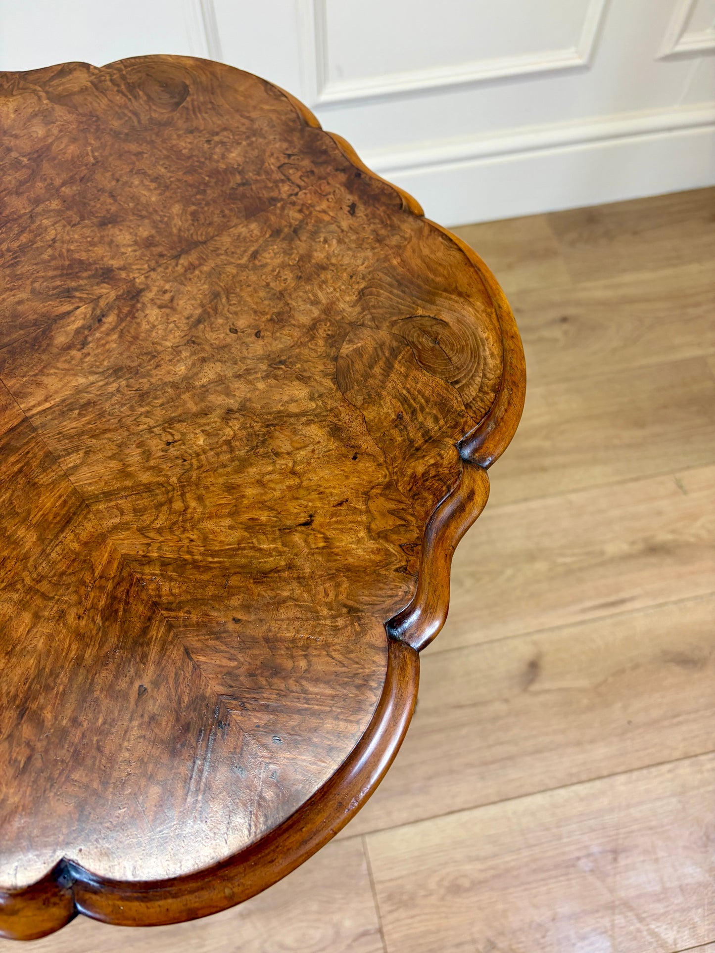 Antique Victorian burr walnut lamp table with tripod base and scroll feet