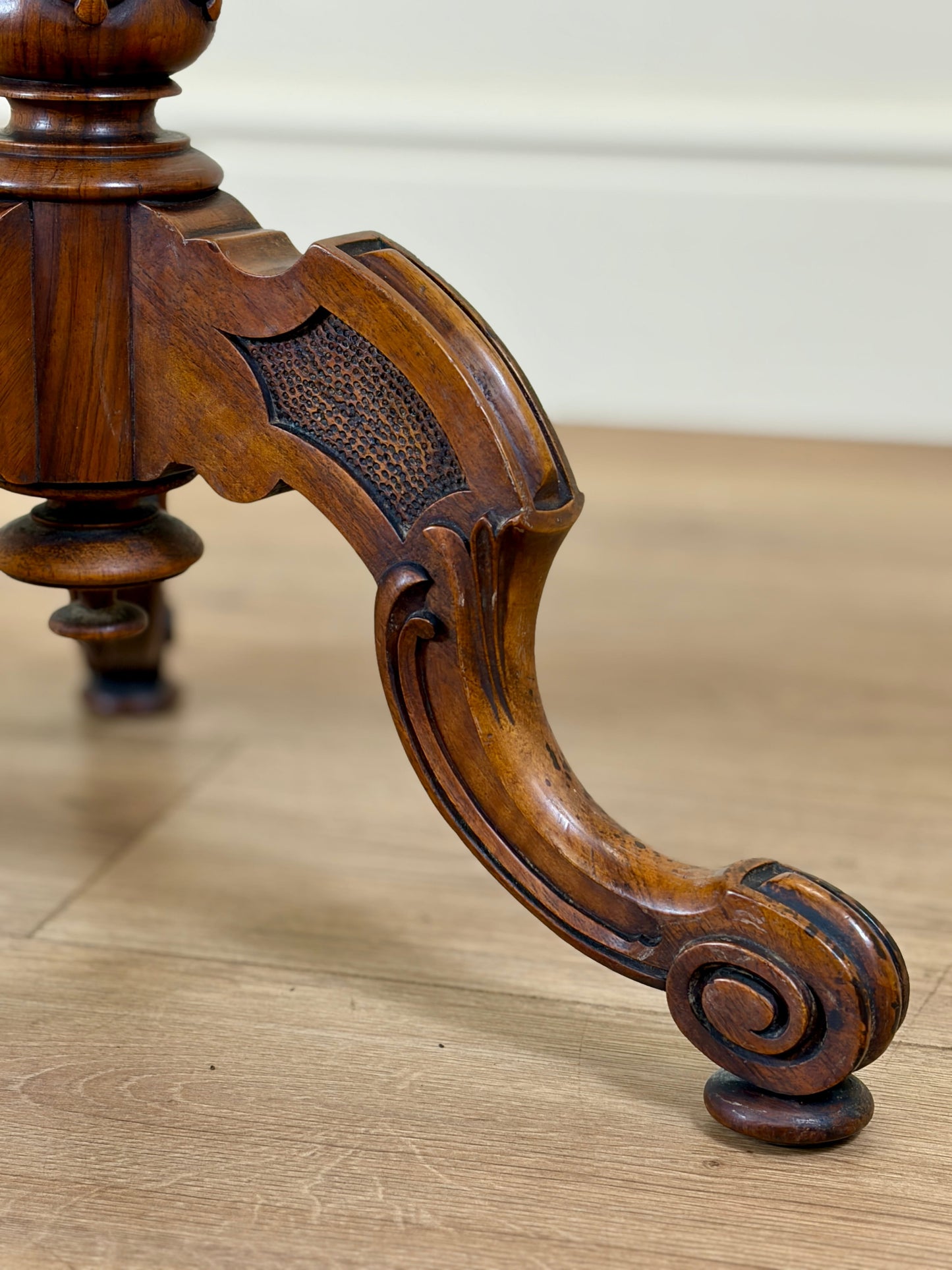 Antique Victorian burr walnut lamp table with tripod base and scroll feet