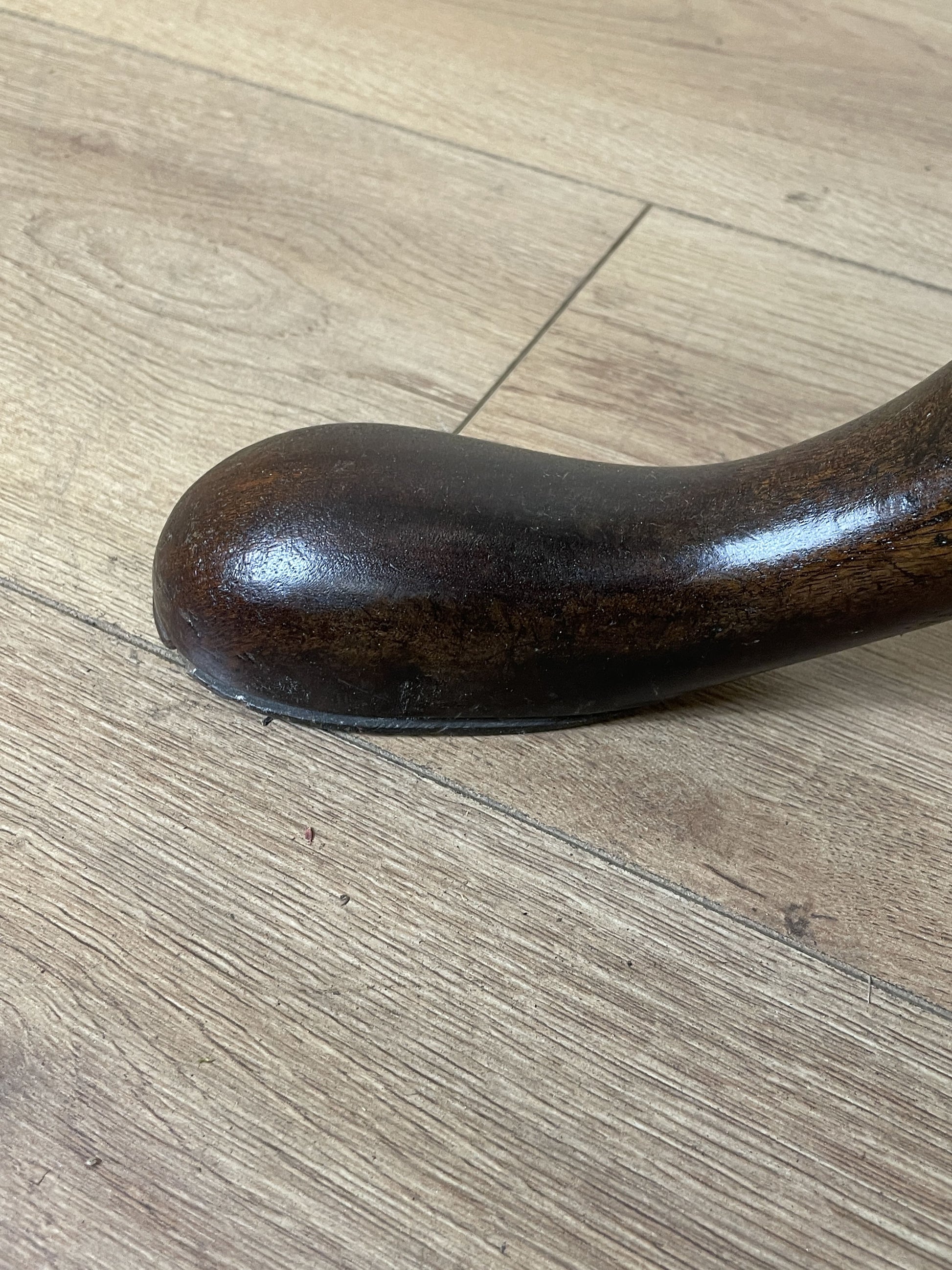 Wooden foot on a wooden floor