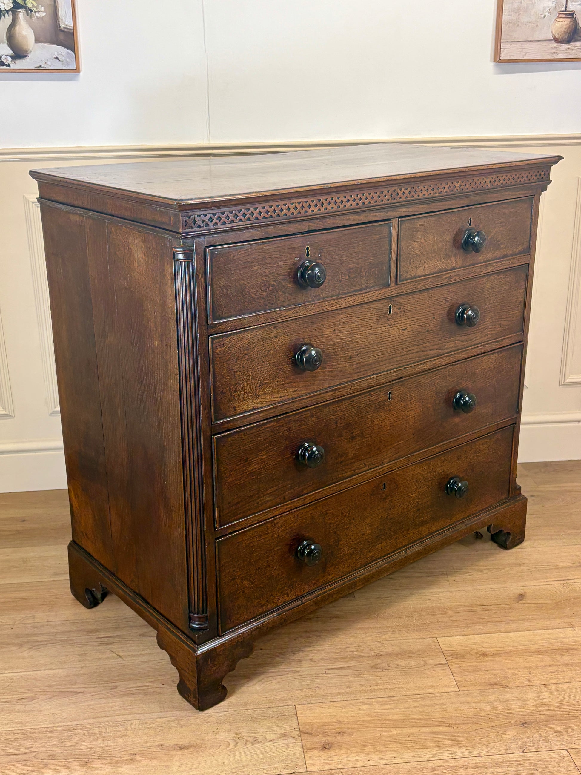 antique georgian oak chest of drawers with carved detail