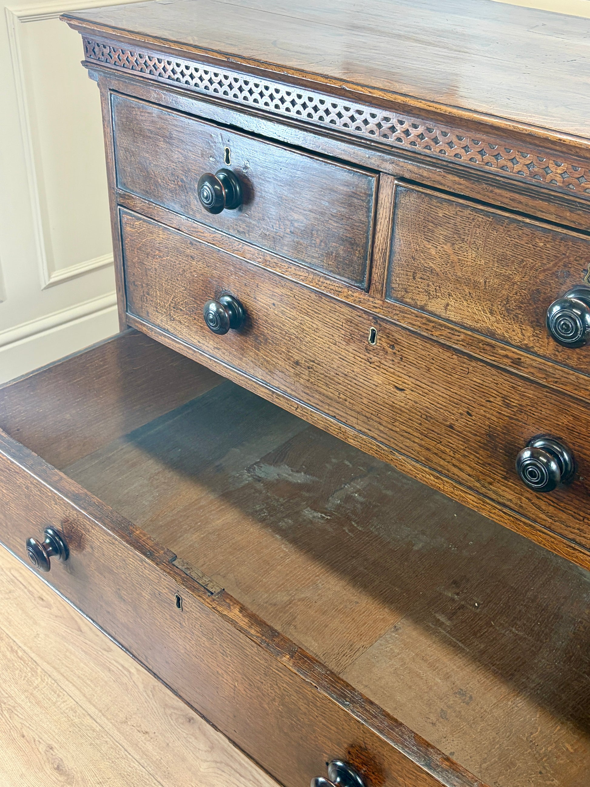 antique georgian oak chest of drawers with carved detail