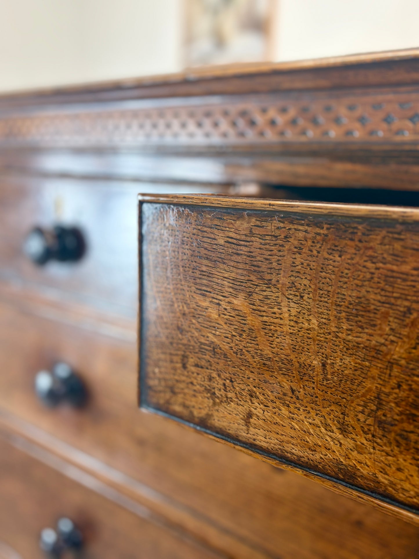 antique georgian oak chest of drawers with carved detail