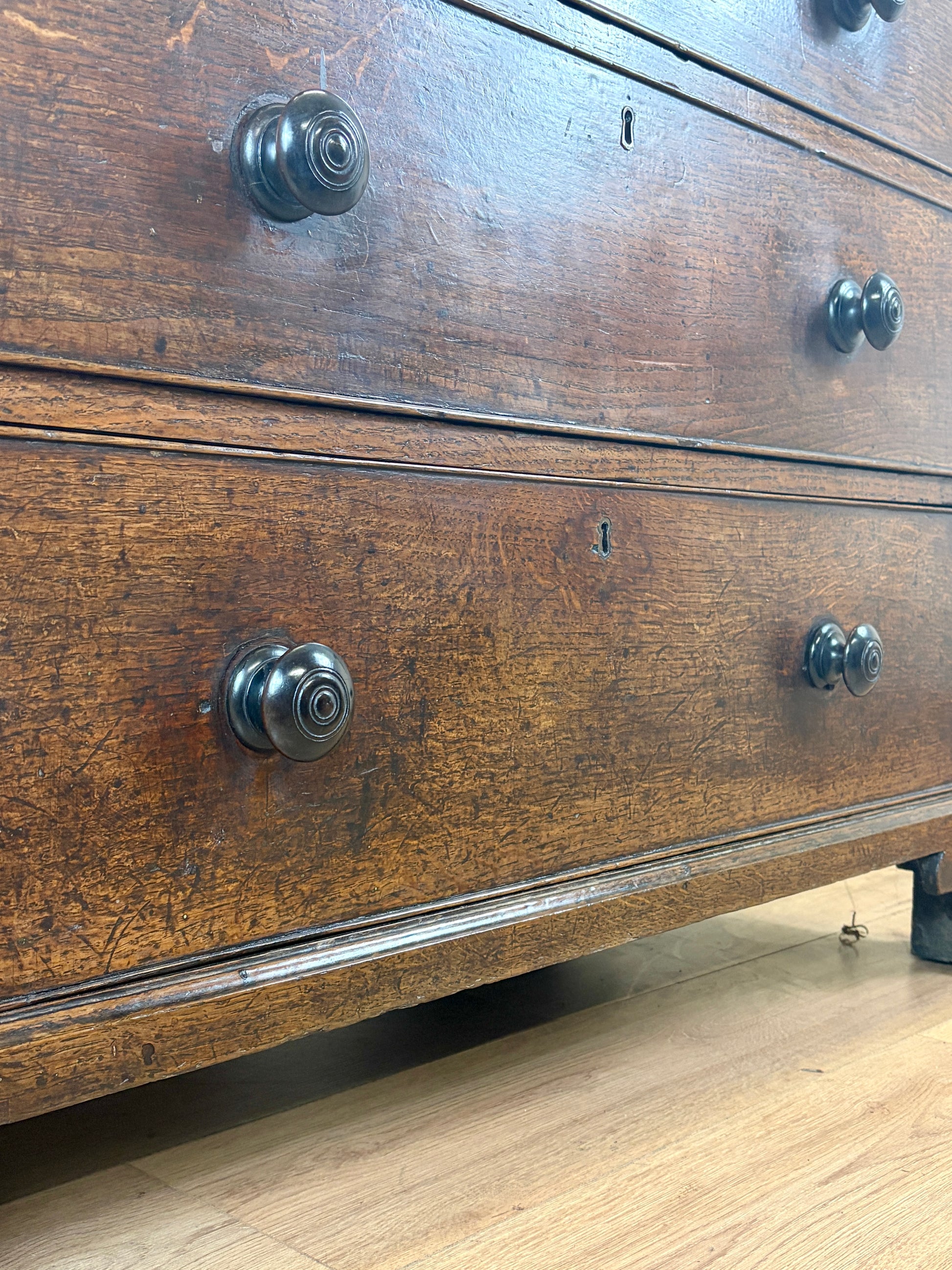 antique georgian oak chest of drawers with carved detail