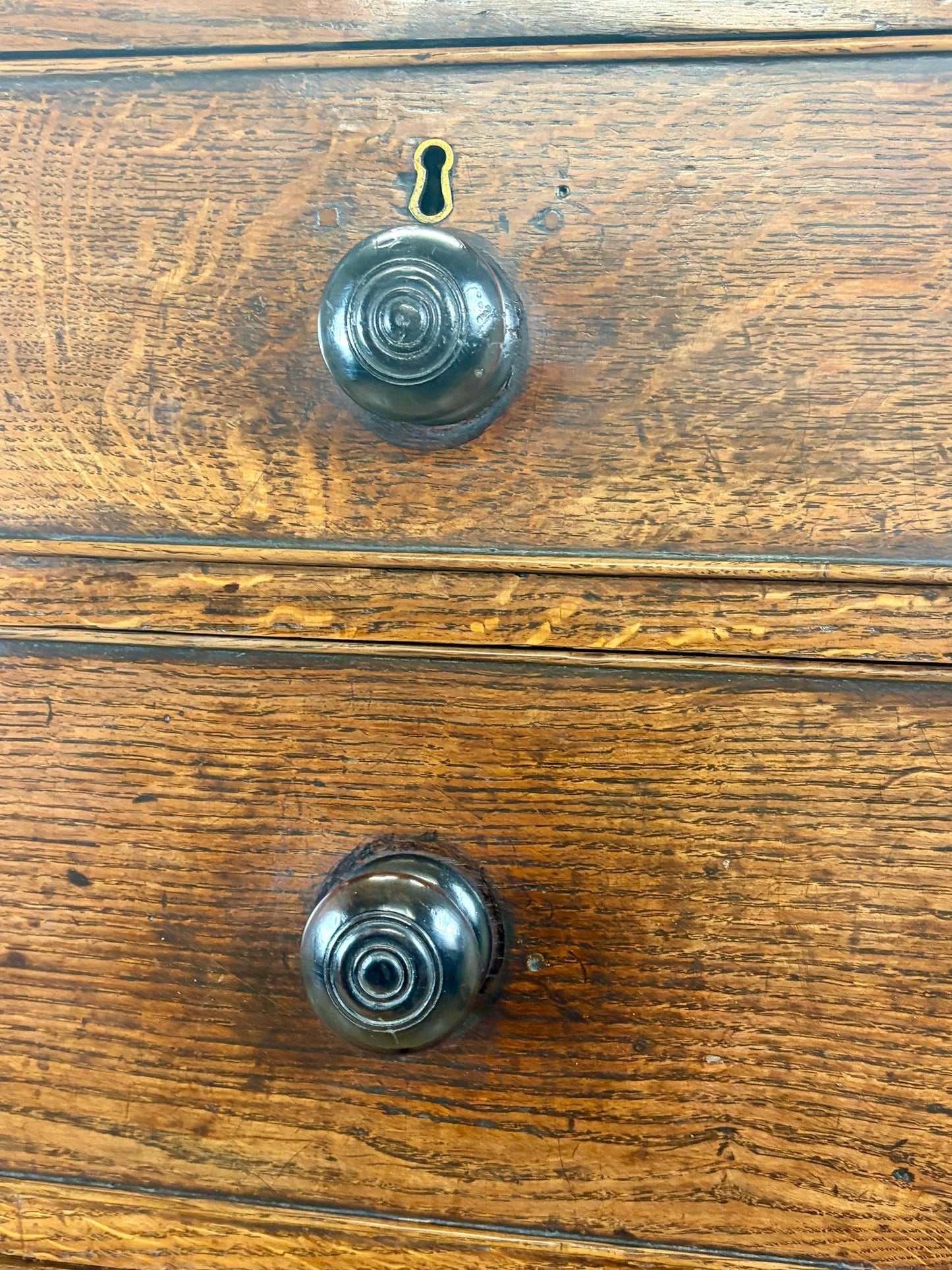 antique georgian oak chest of drawers with carved detail