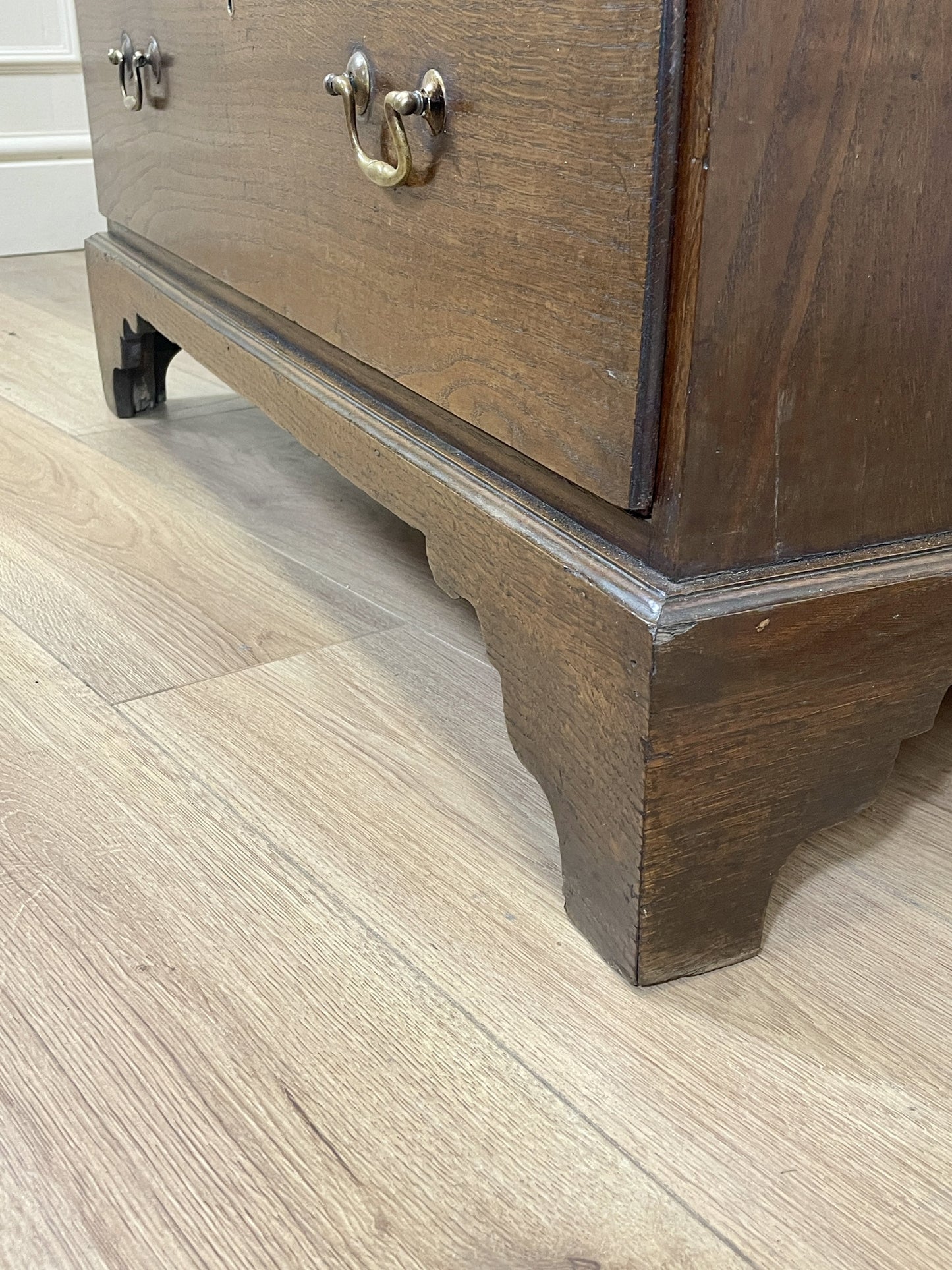 Antique Georgian oak chest of drawers with original brass handles
