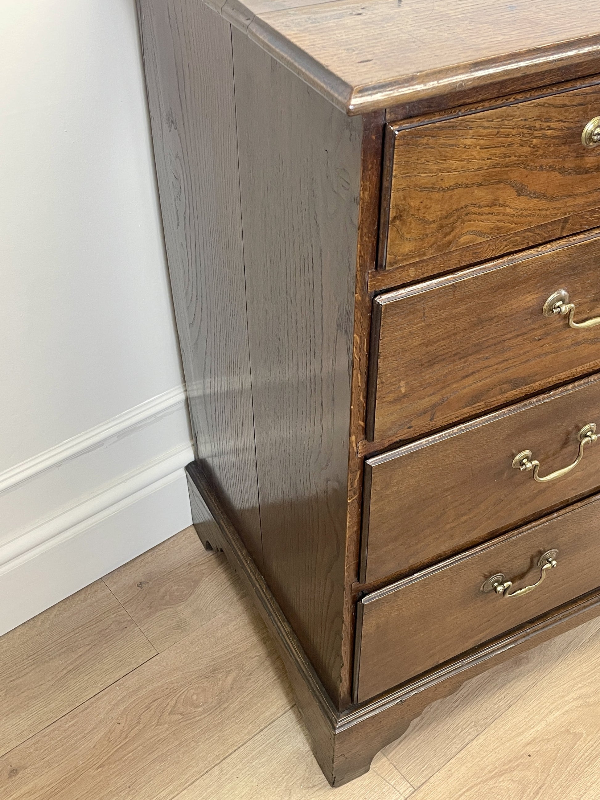 Antique Georgian oak chest of drawers with original brass handles