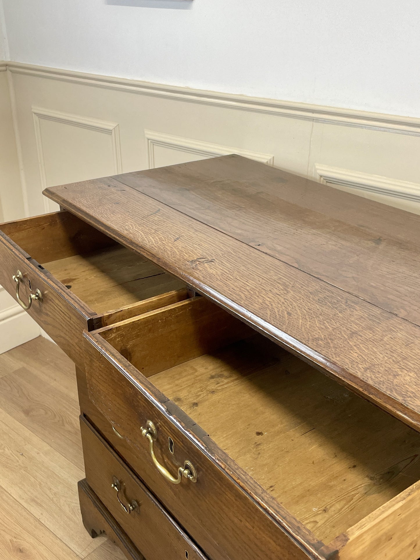 Antique Georgian oak chest of drawers with original brass handles