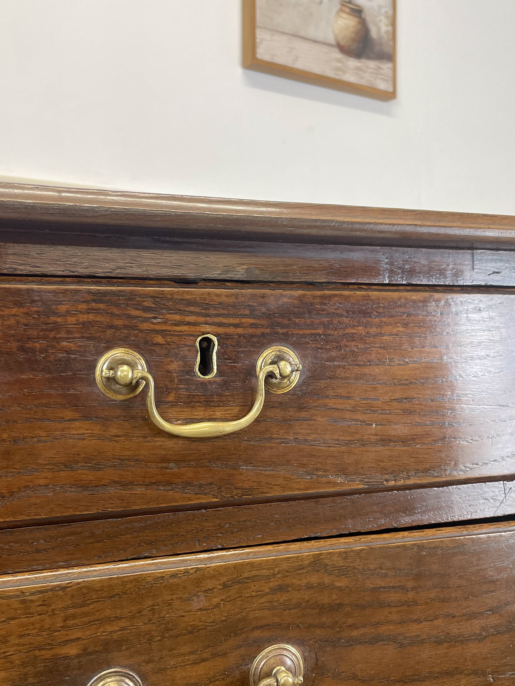 Antique Georgian oak chest of drawers with original brass handles