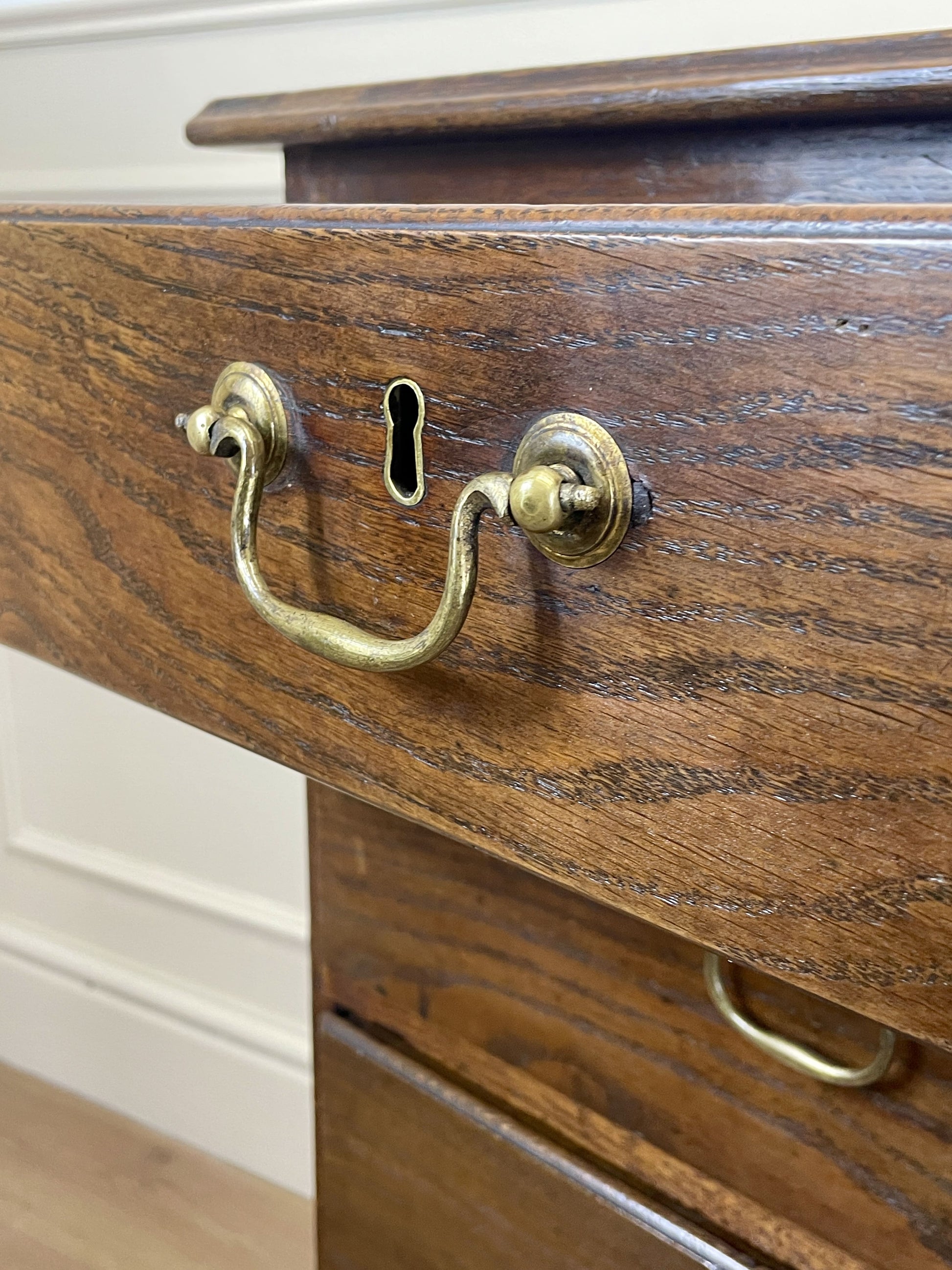 Antique Georgian oak chest of drawers with original brass handles