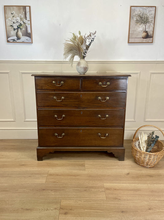 Antique Georgian oak chest of drawers with original brass handles