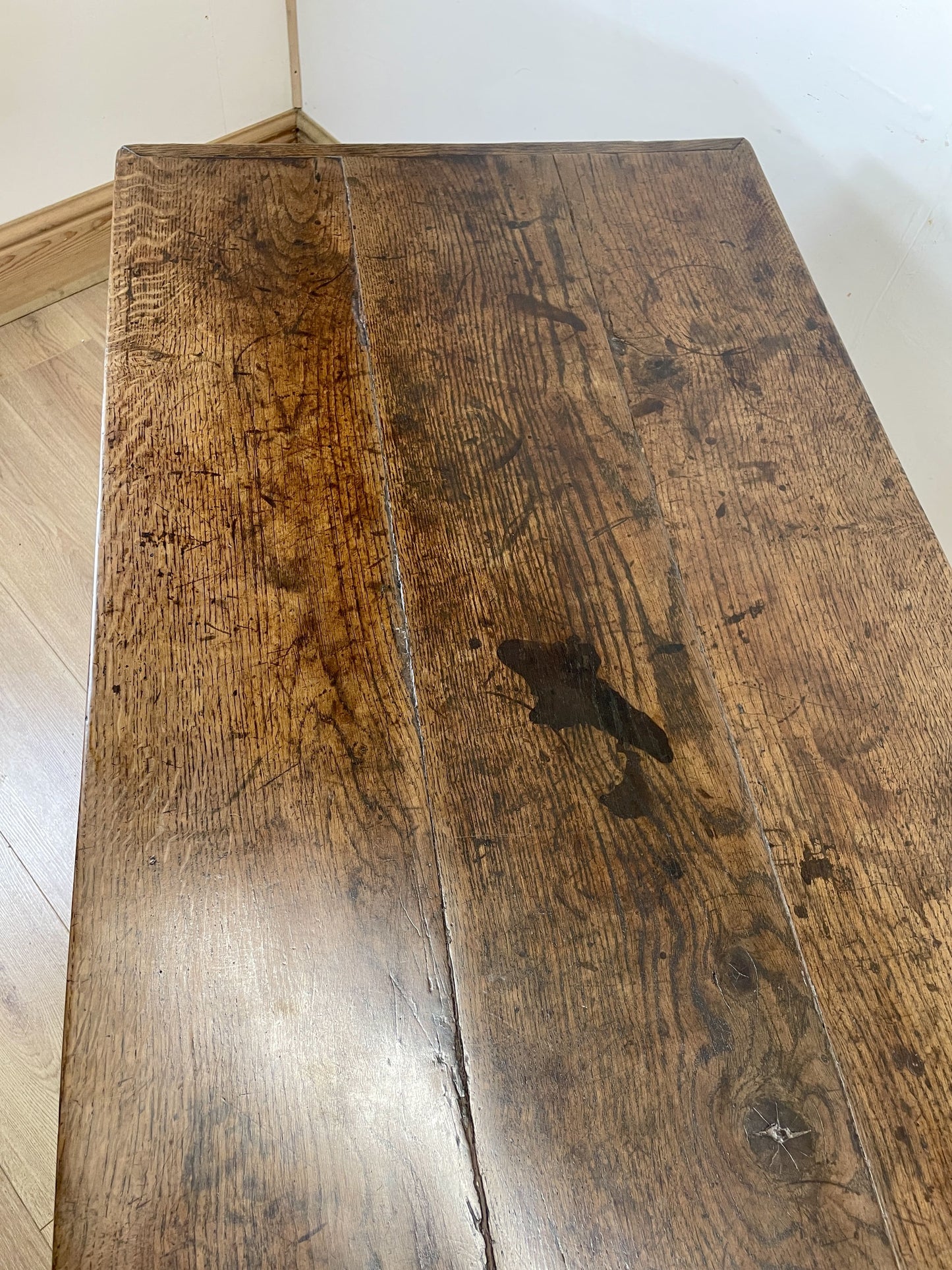 Close-up of a wooden surface with visible grain and texture