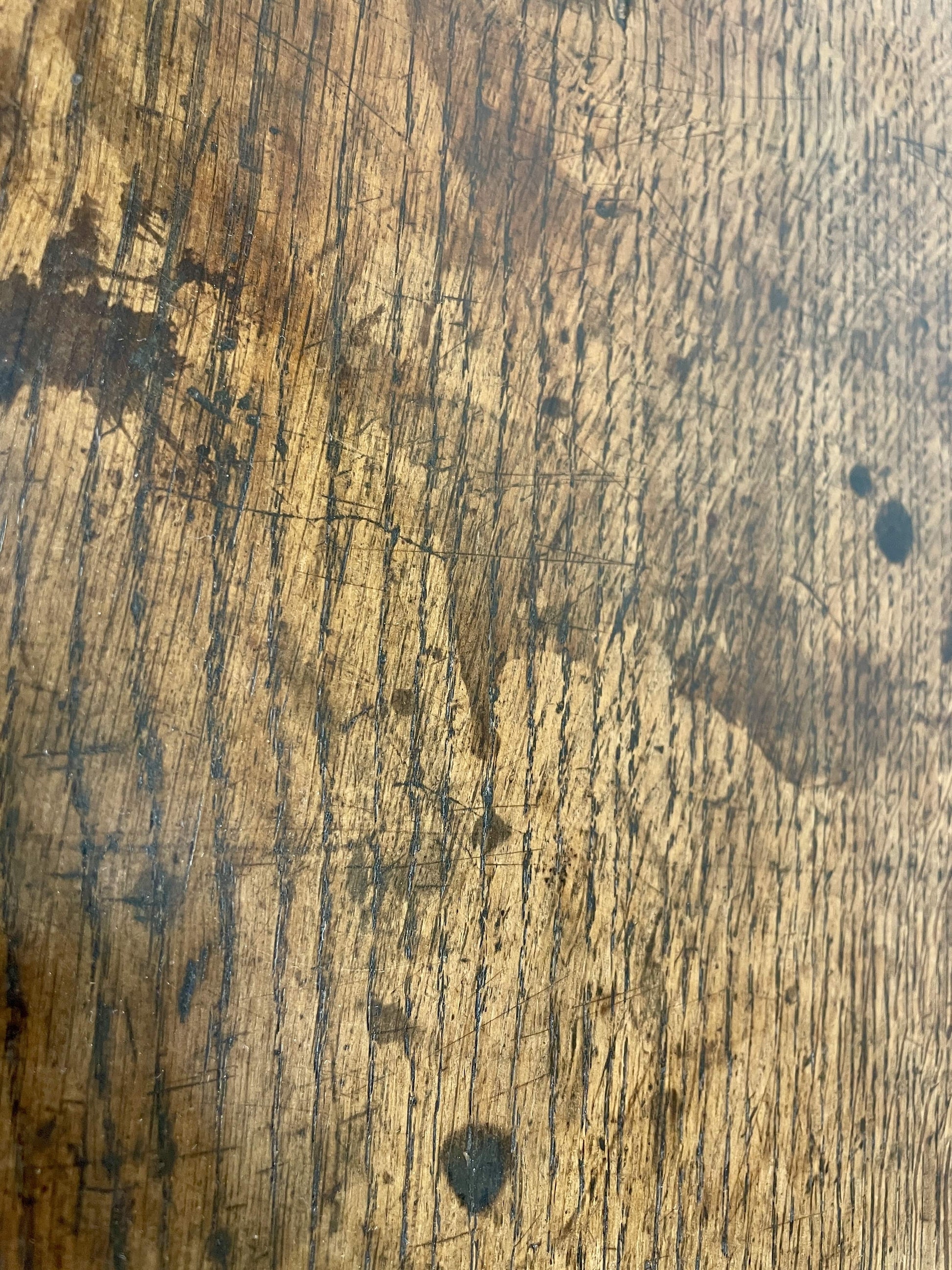 Close-up of a wooden surface with visible grain and texture
