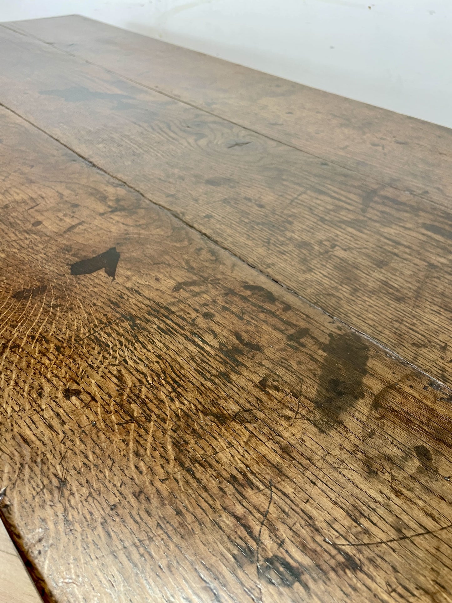 Close-up of a wooden surface with visible grain and texture