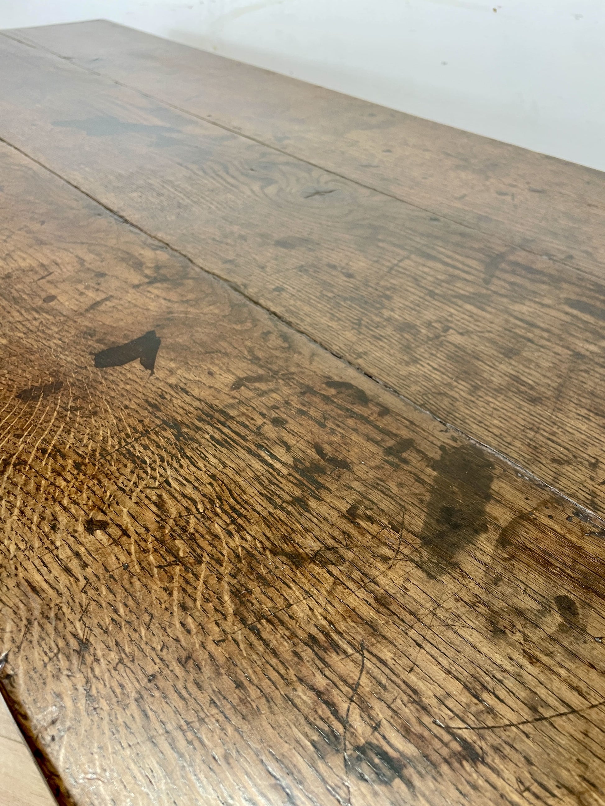 Close-up of a wooden surface with visible grain and texture