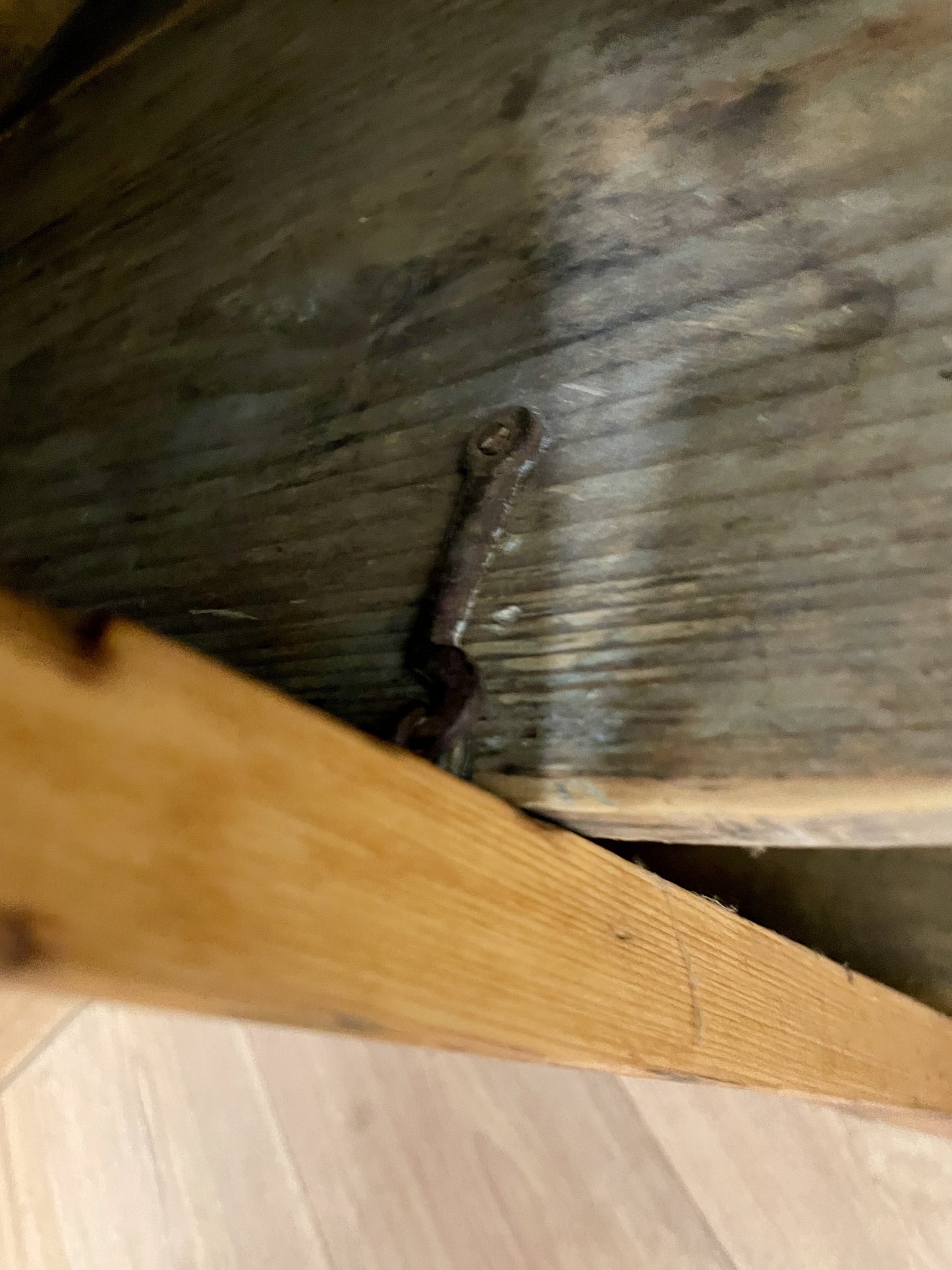 Small lock on a wooden floor