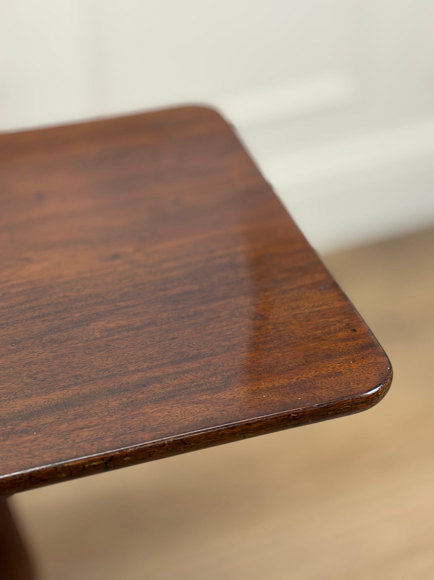 Close-up of a wooden surface with a blurred background