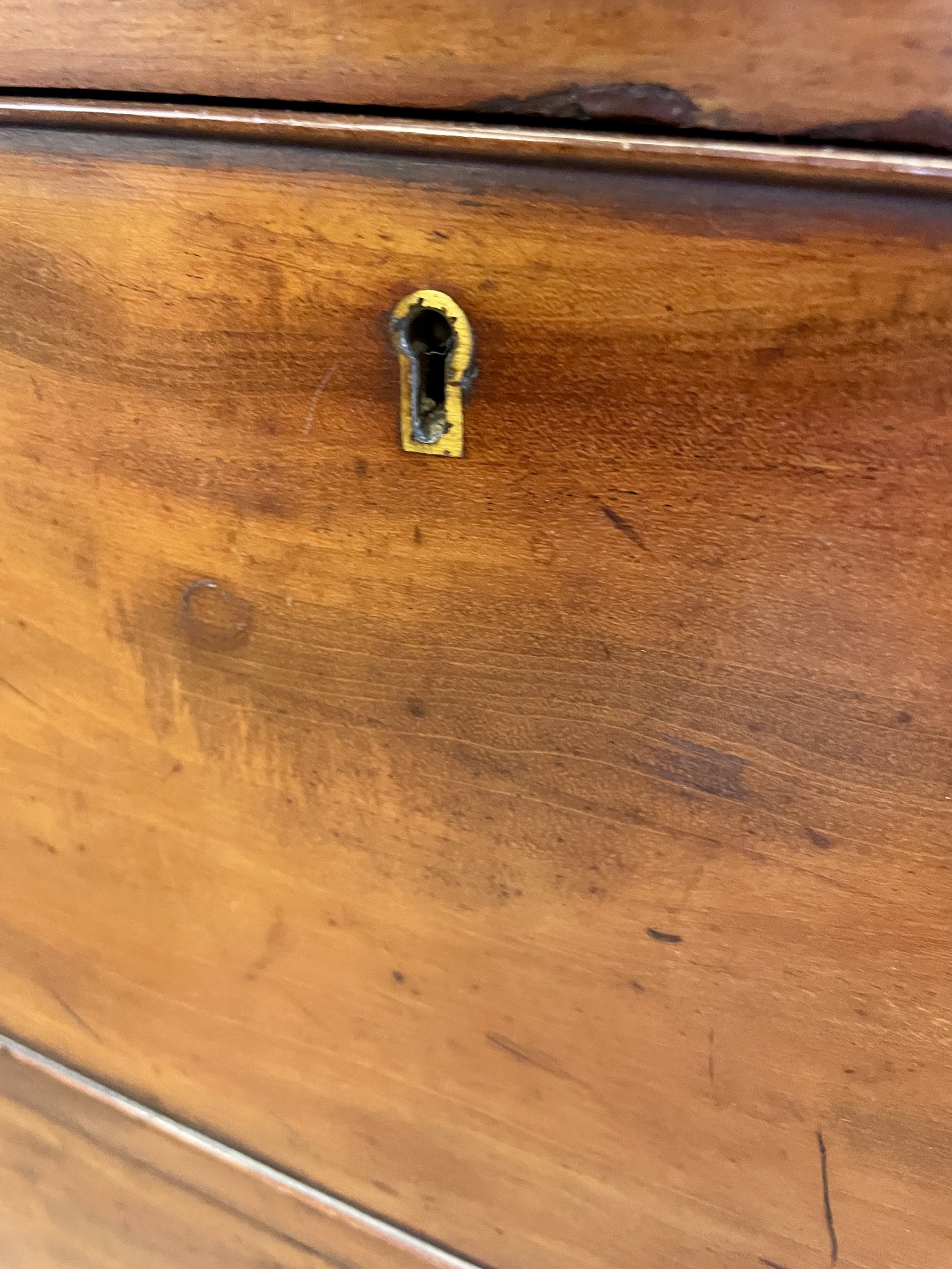 Close-up of a wooden surface with a keyhole
