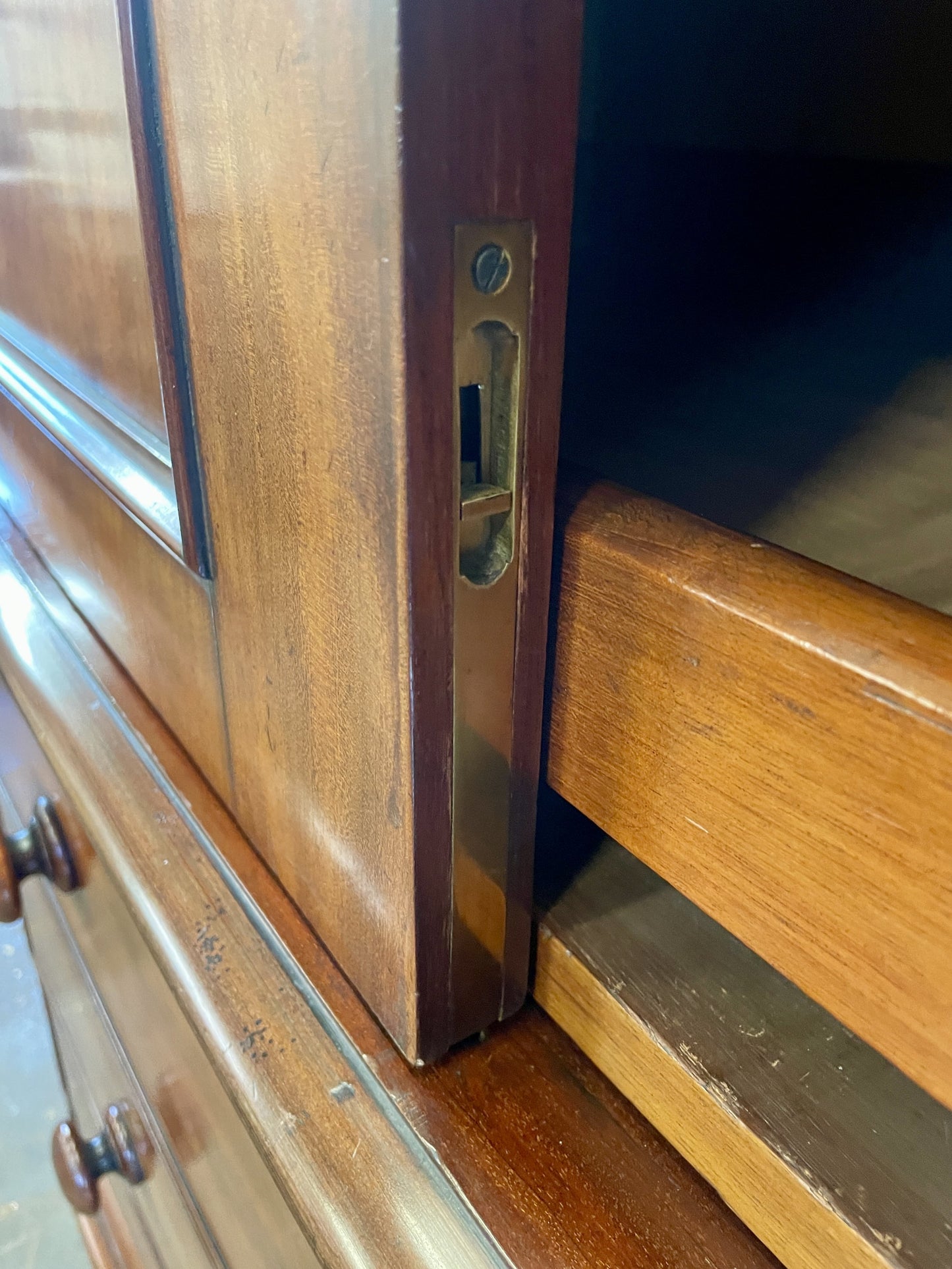 Wooden cabinet with a visible lock mechanism