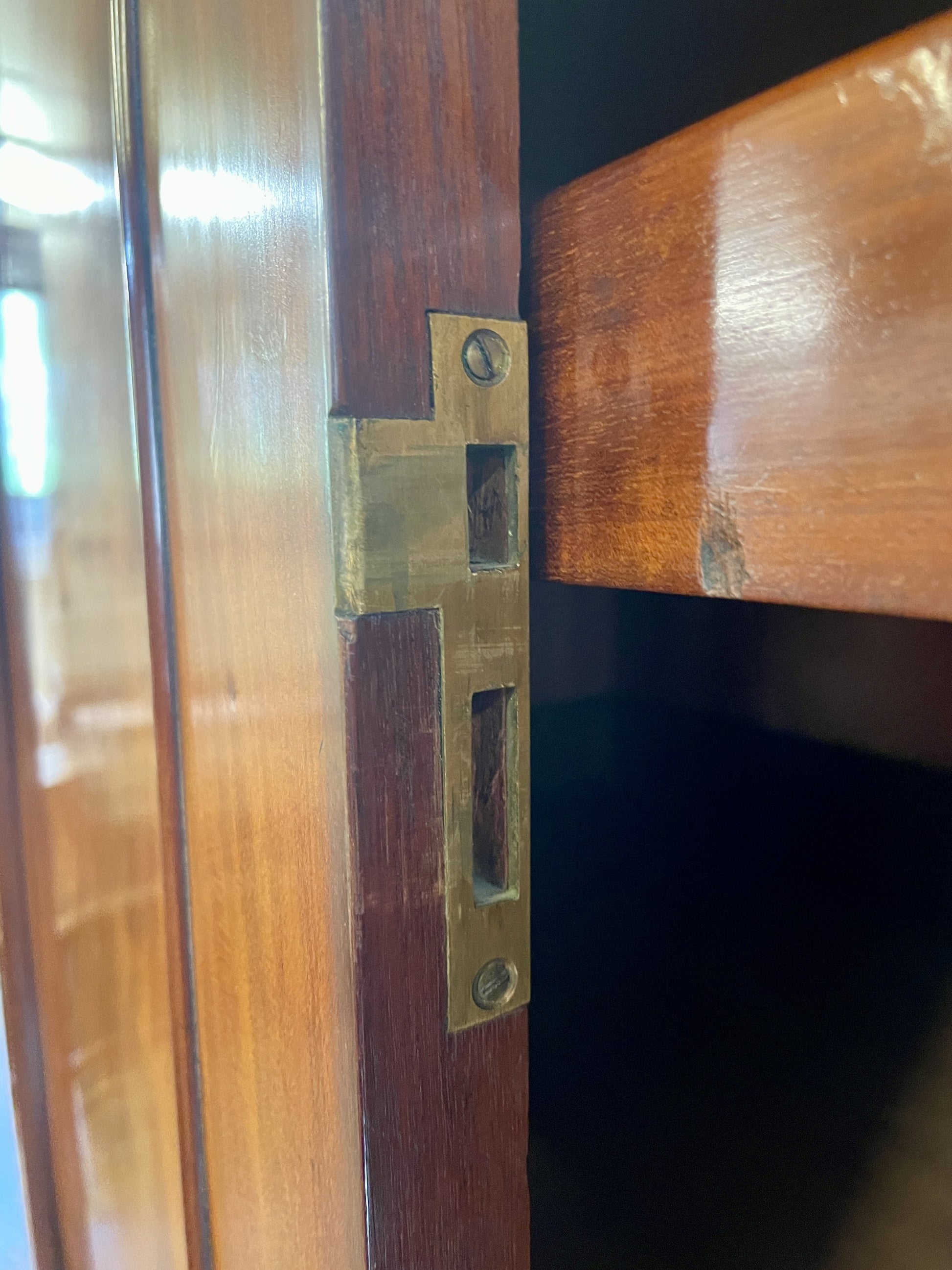 Wooden door with a metal lock mechanism