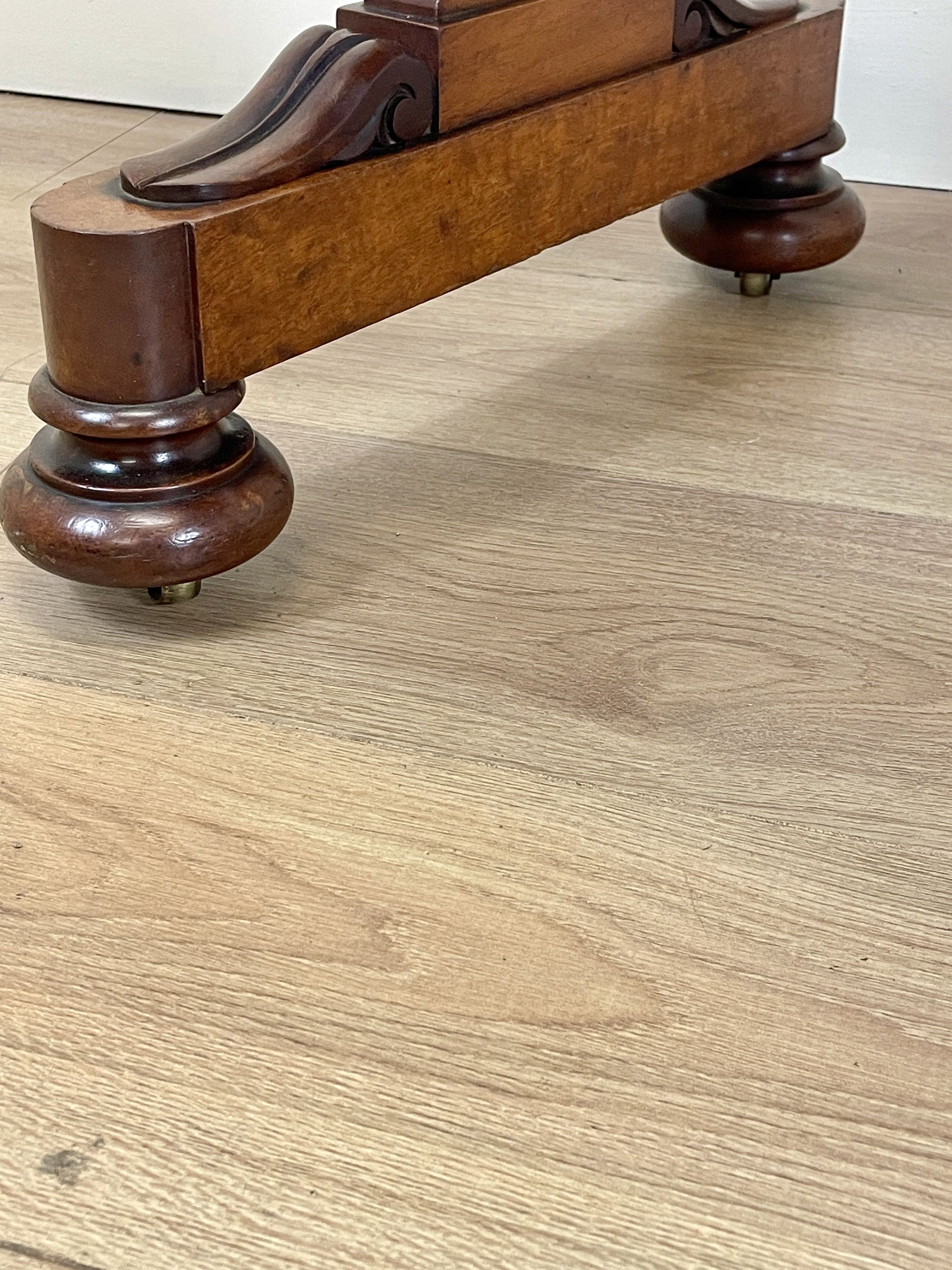 Wooden furniture leg on a wooden floor