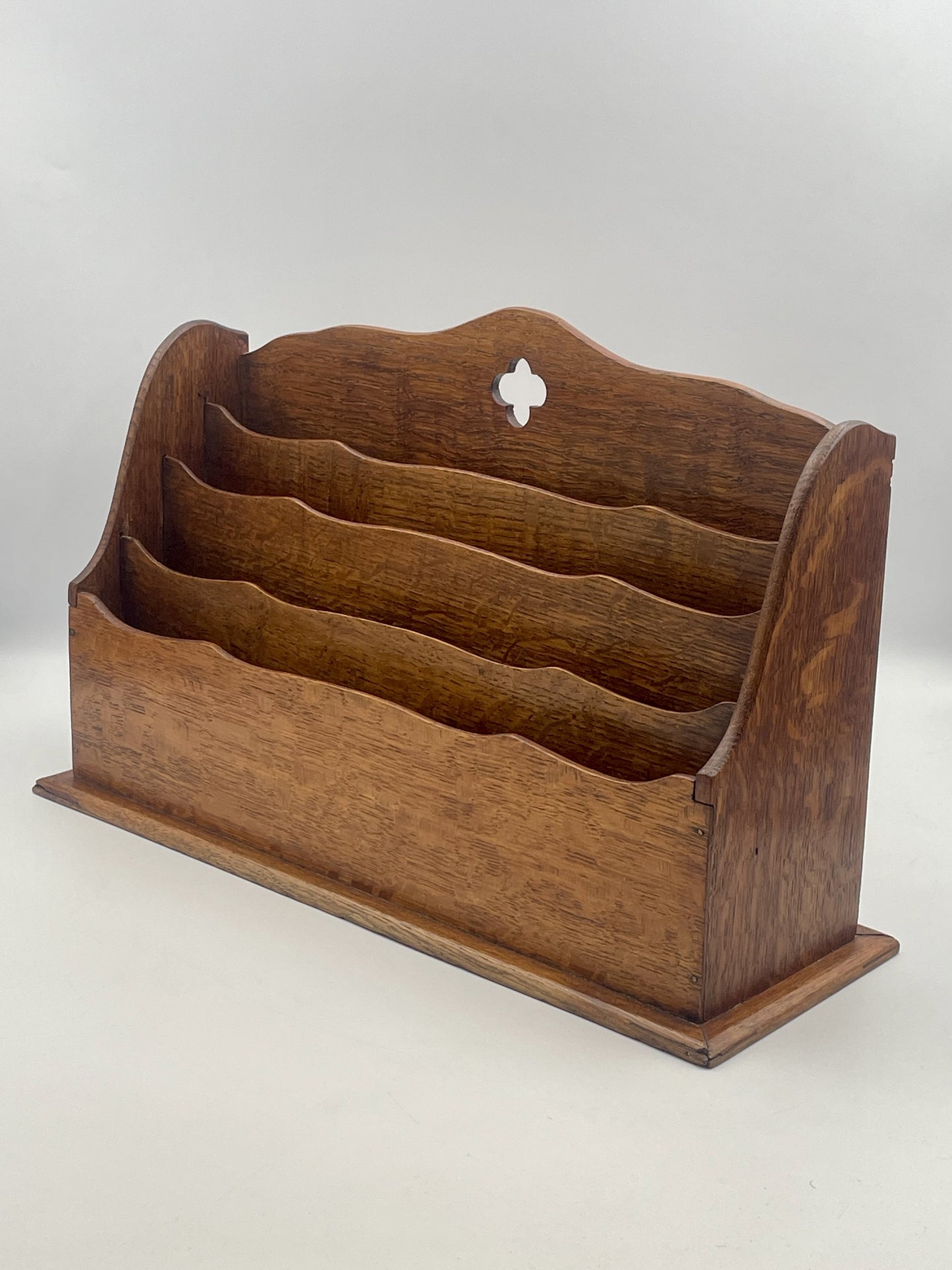 Wooden letter rack on a white background