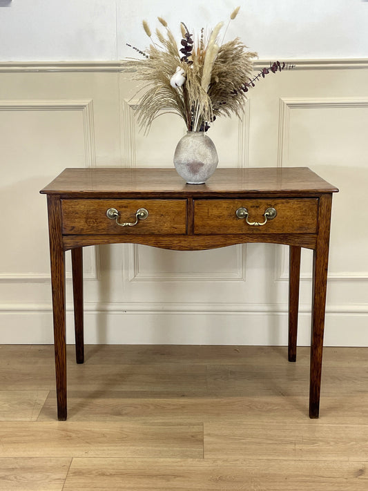 Antique oak side table with two drawers in light oak finish