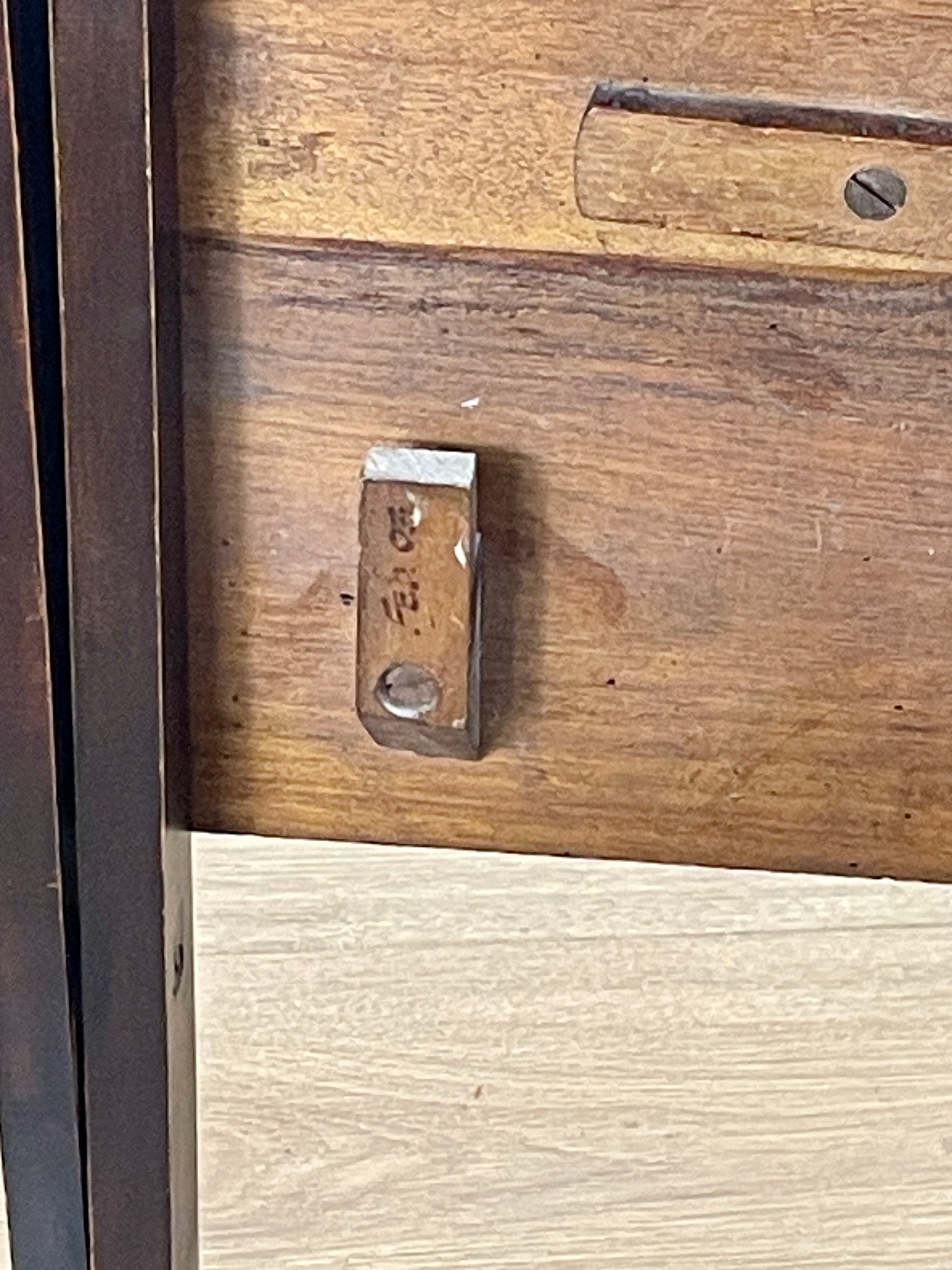 Wooden door with a metal handle and lock mechanism