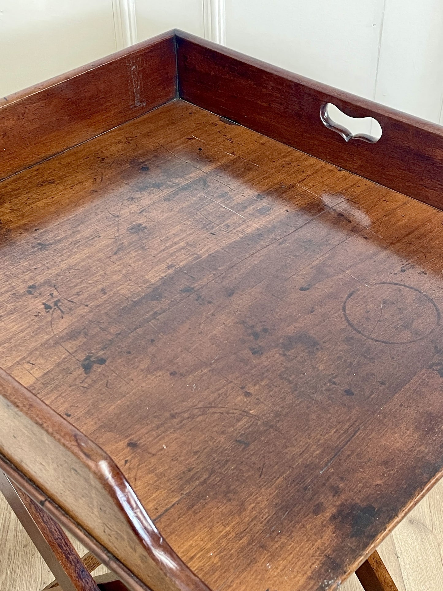 Wooden desk with a metal handle on a white background