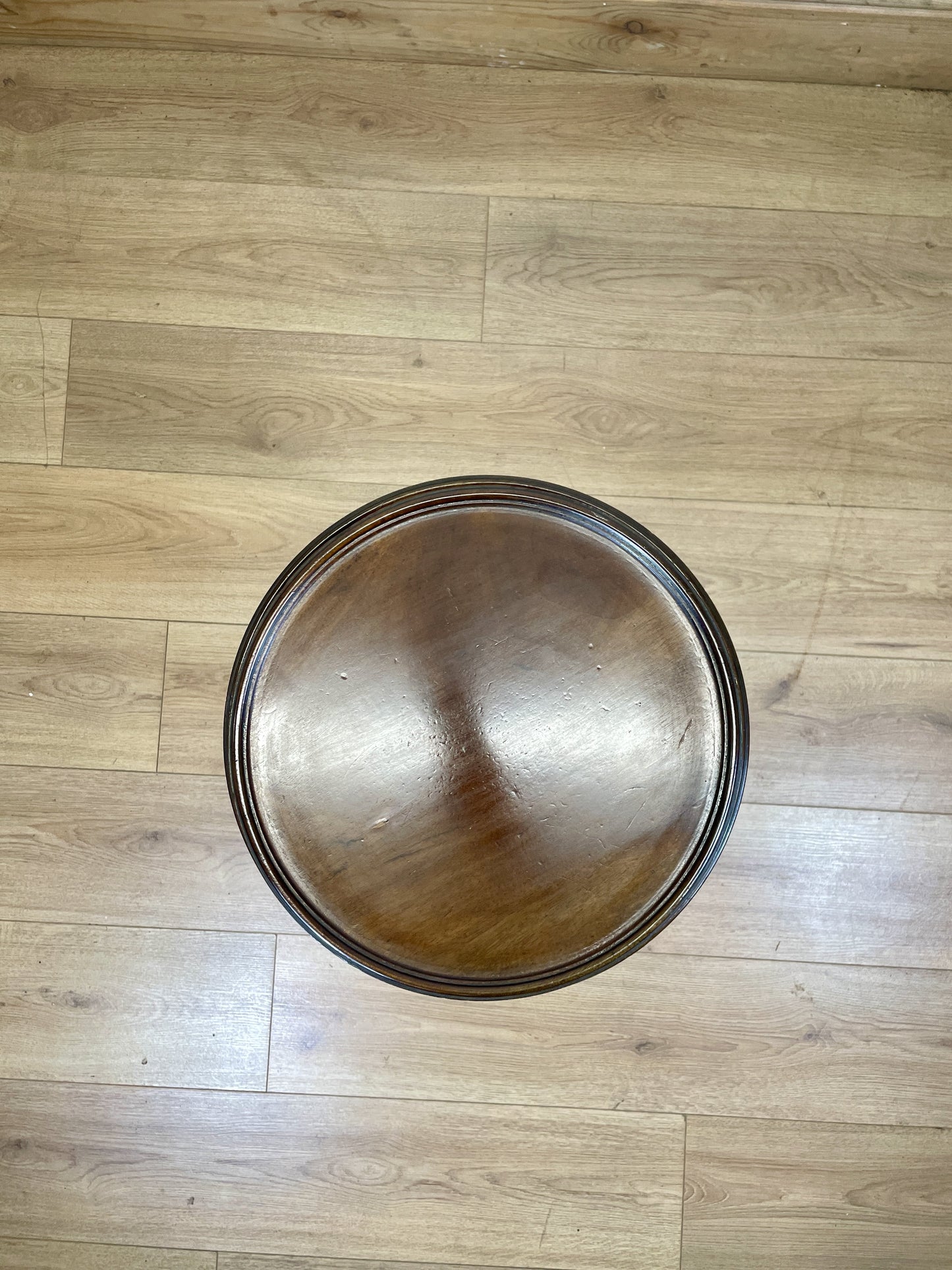 Wooden bowl on a wooden floor