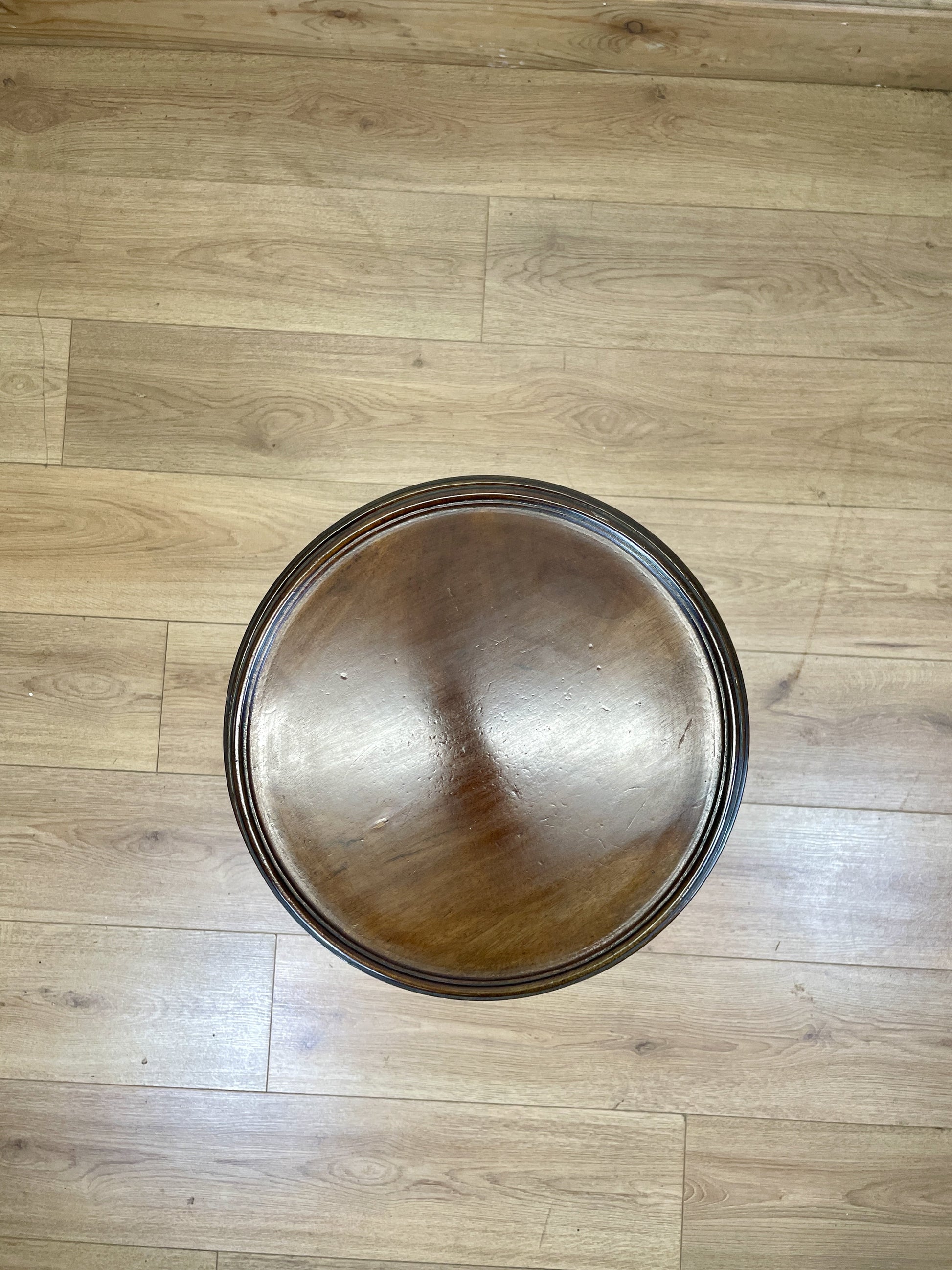 Wooden bowl on a wooden floor