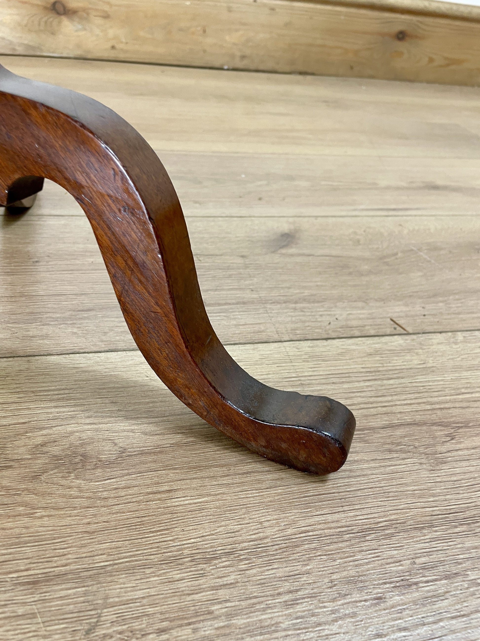 Wooden leg on a wooden floor
