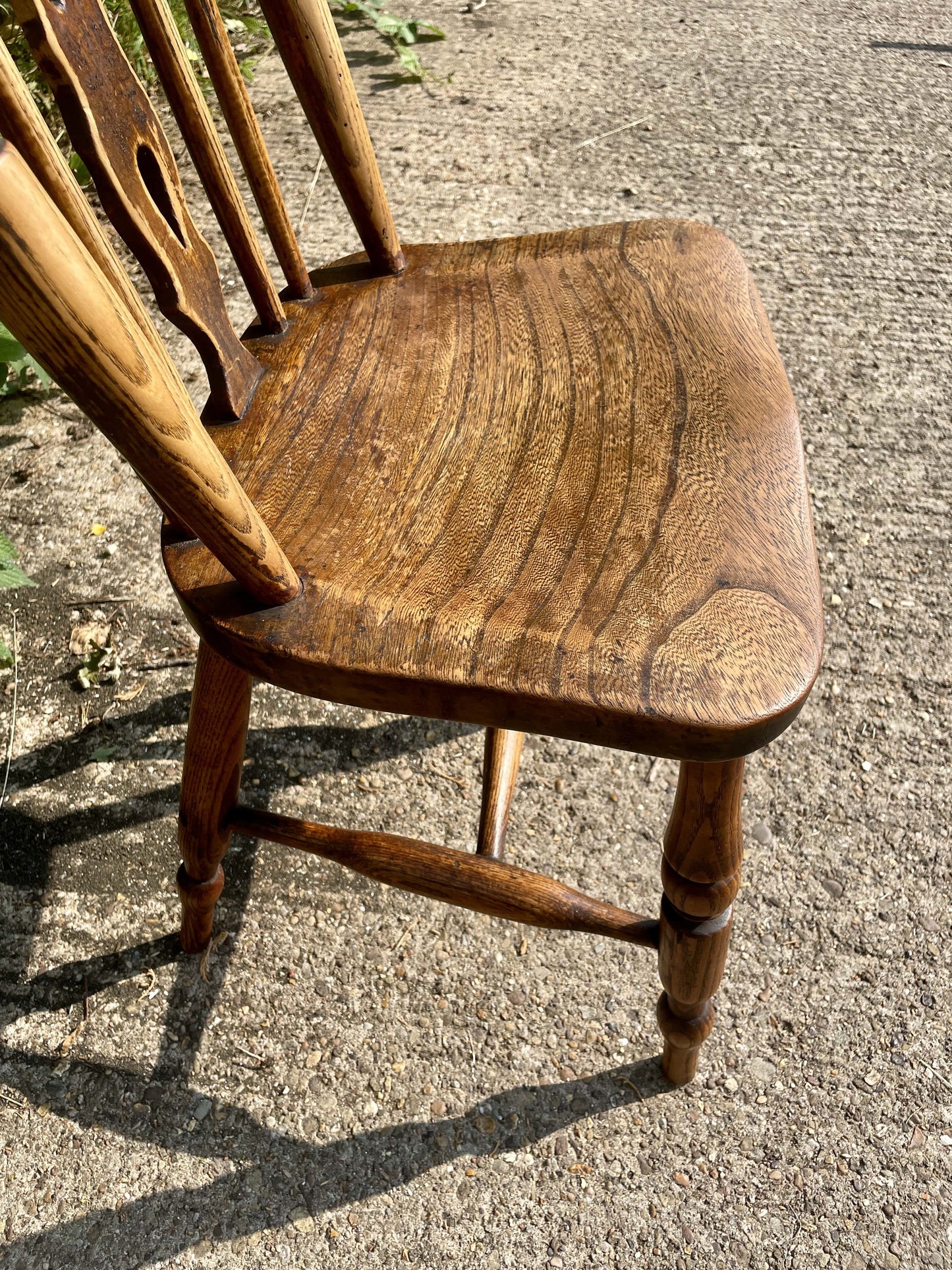 Wooden chair on a concrete surface