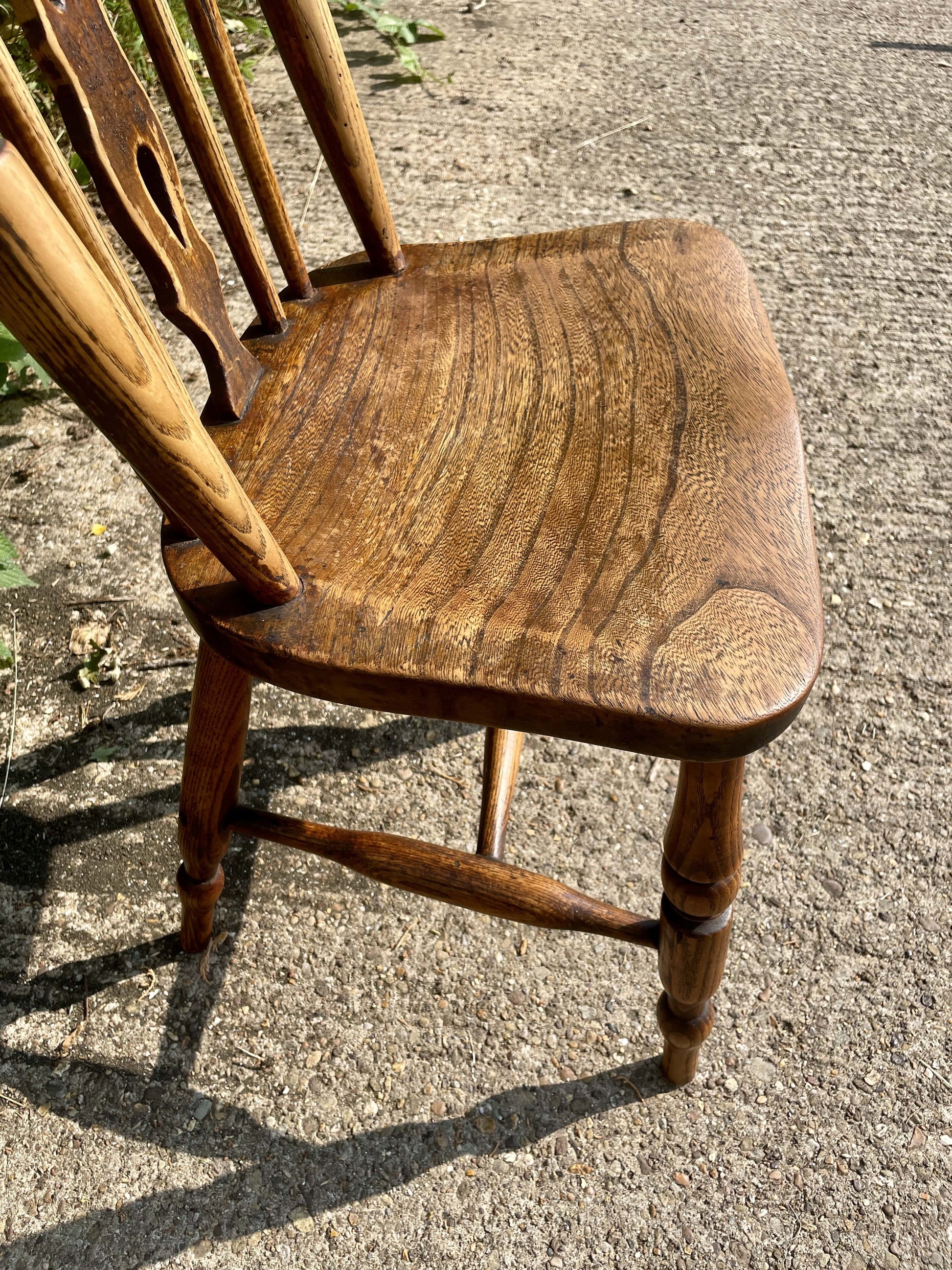 Wooden chair on a concrete surface