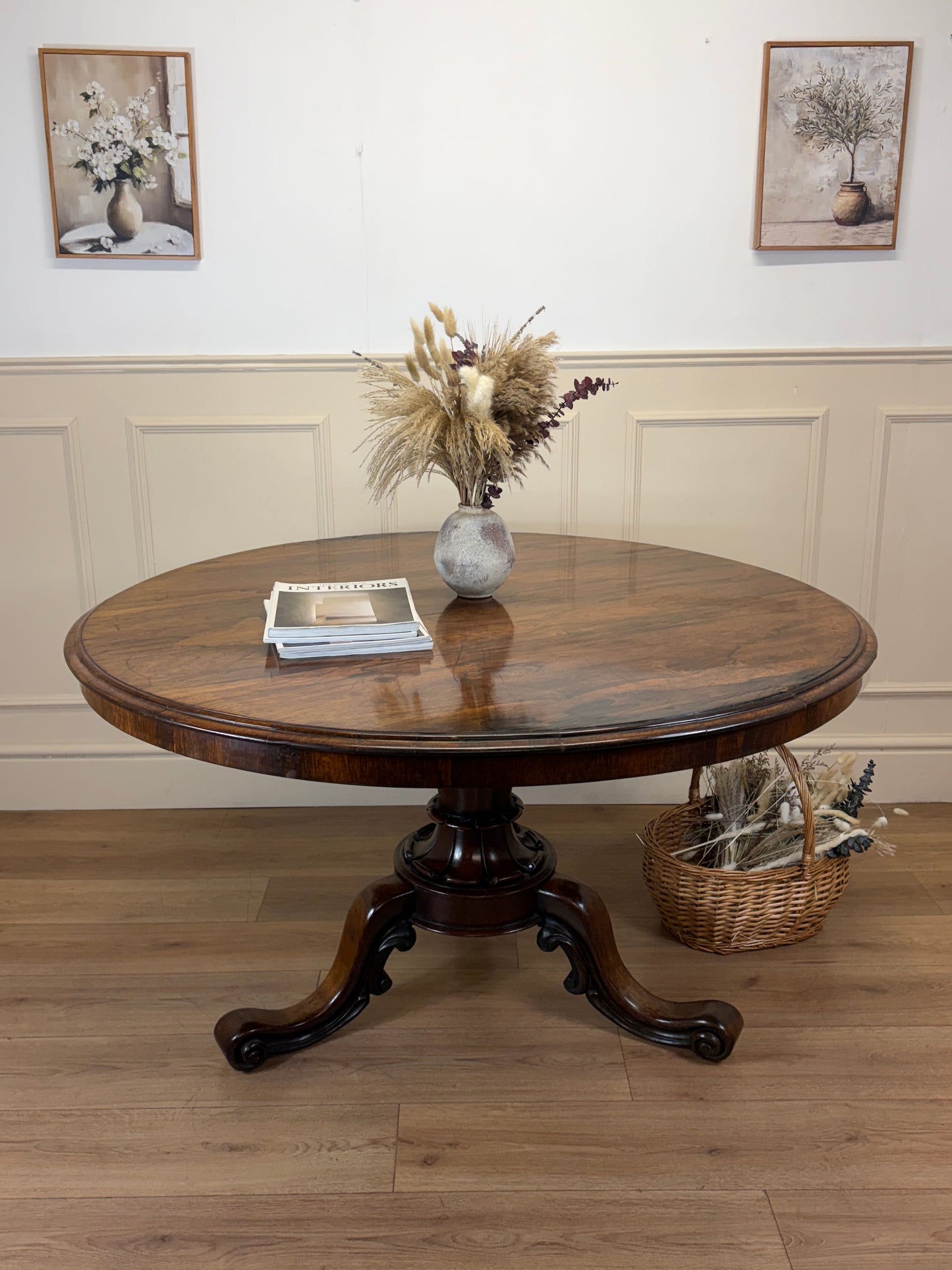 Antique Victorian rosewood breakfast table with tilt top on castors, front view