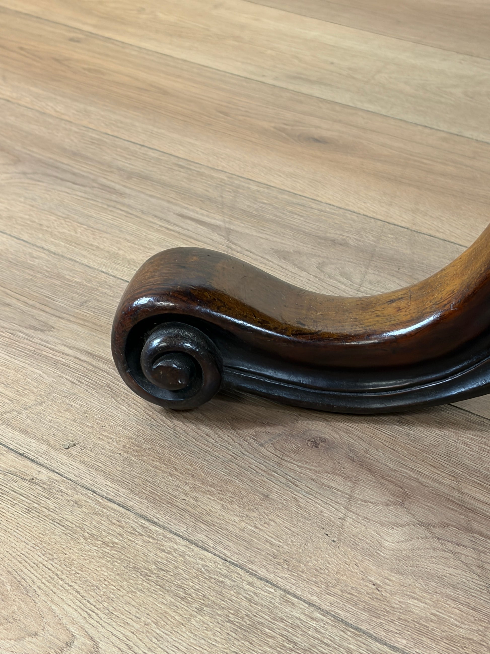 Wooden foot on a wooden floor