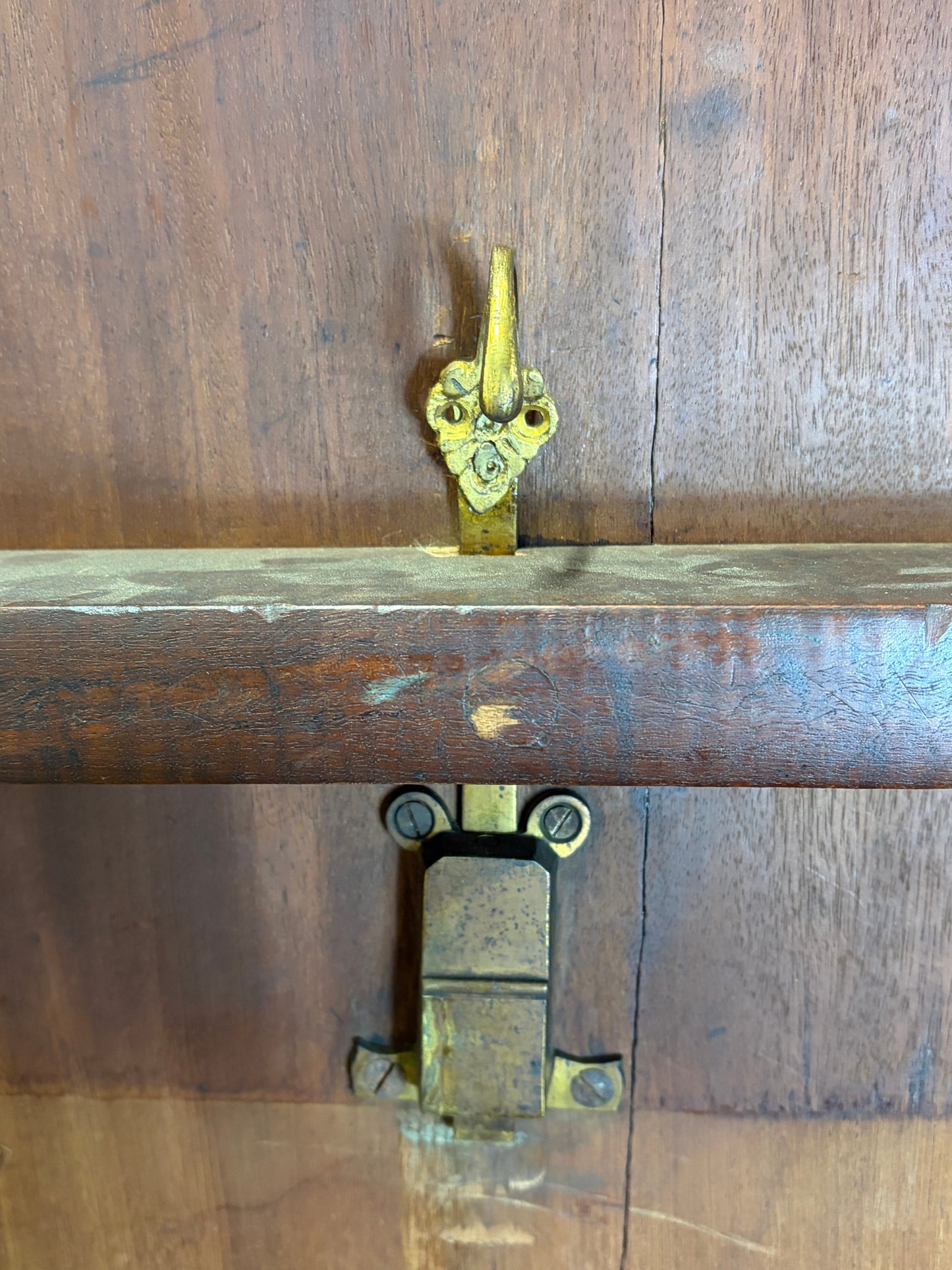 Wooden door with brass hardware