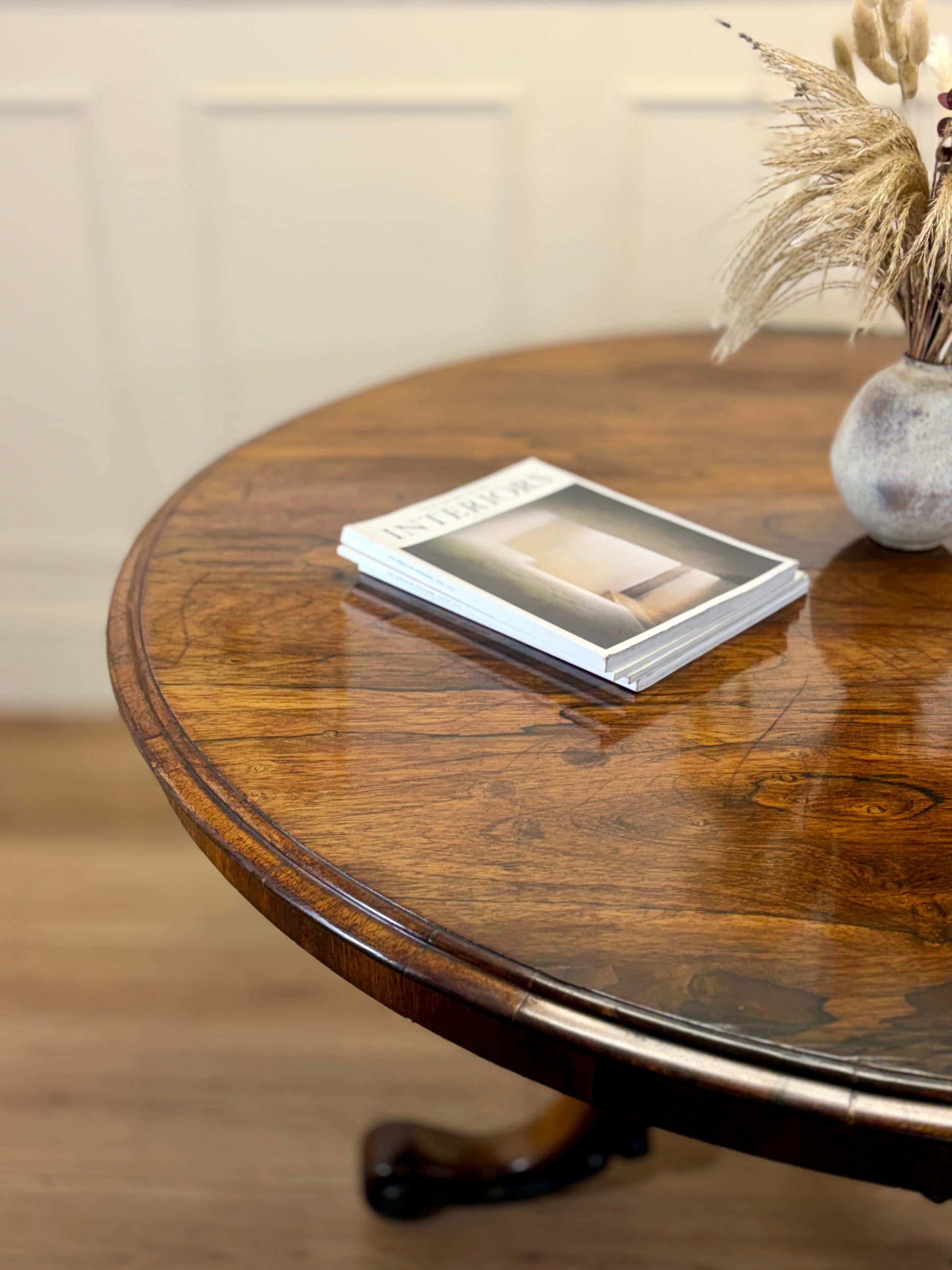 Antique Victorian rosewood breakfast table with tilt top on castors