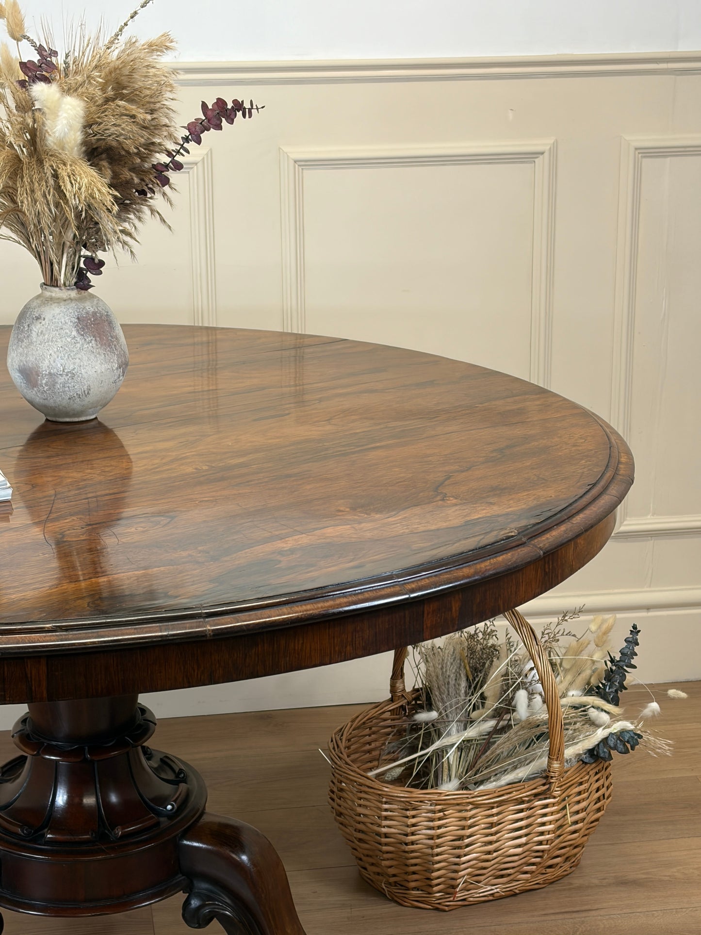 Antique Victorian rosewood breakfast table with tilt top on castors