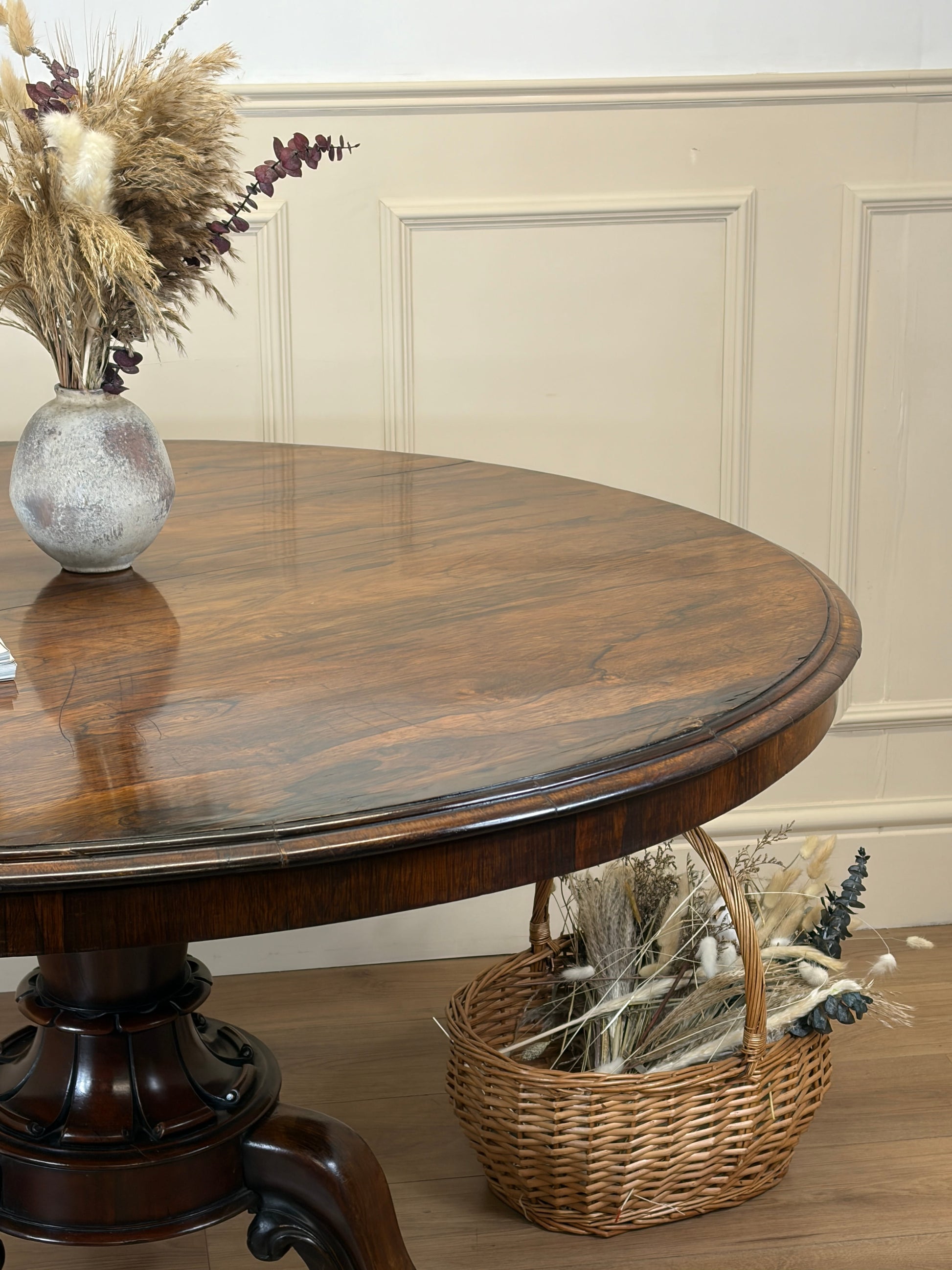Antique Victorian rosewood breakfast table with tilt top on castors